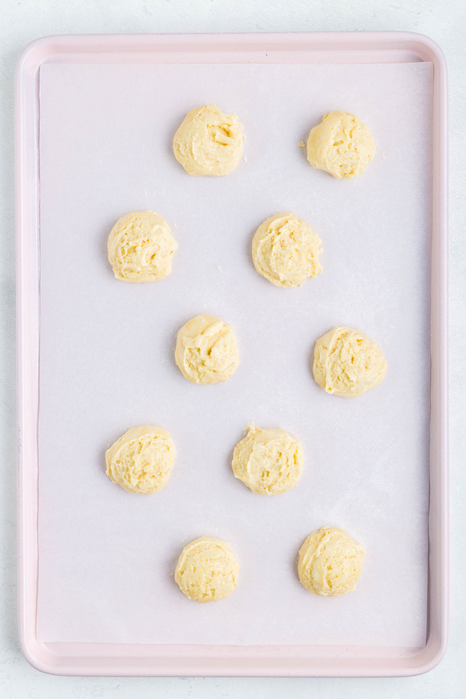 Using a Medium Scoop, Drop Cookies on a Cookie Sheet inches apart