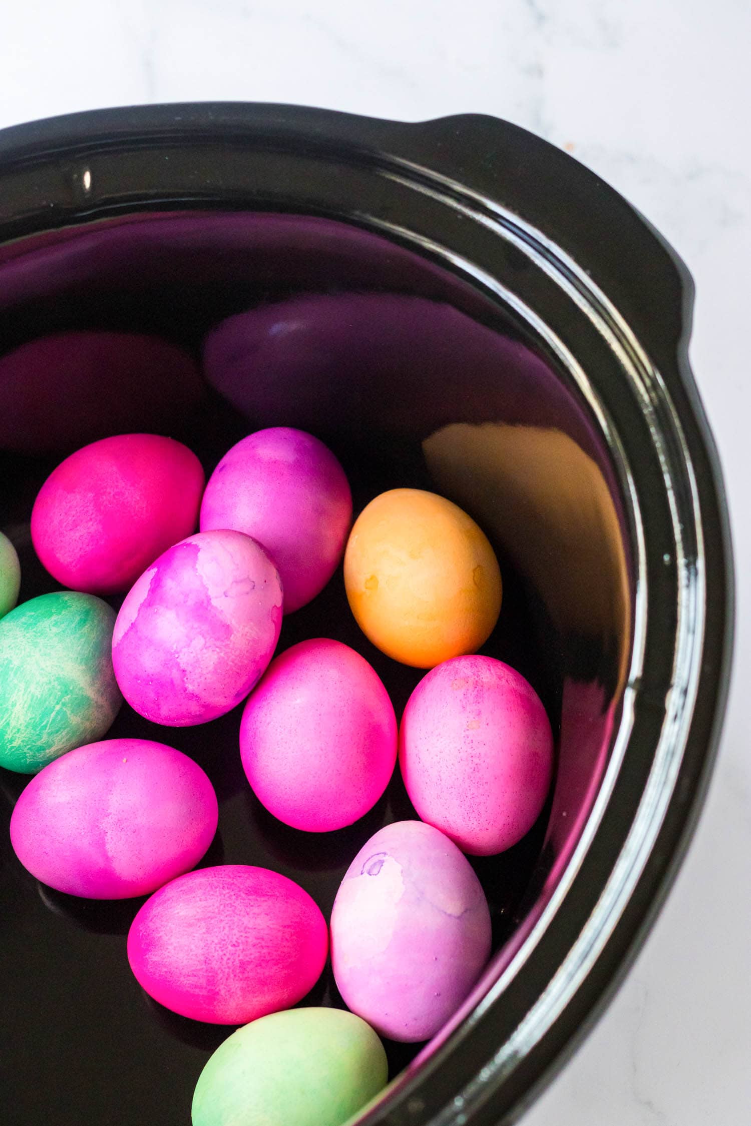 Completed Easter Eggs In the Bottom of a Crock Pot