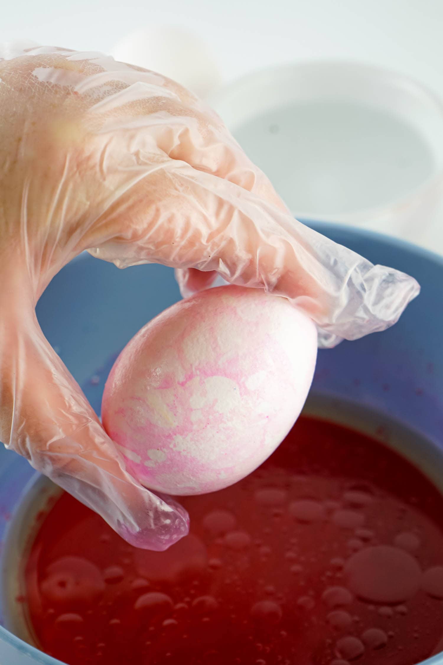 Grab Egg Out of Color Dye and Dab with a Paper Towel