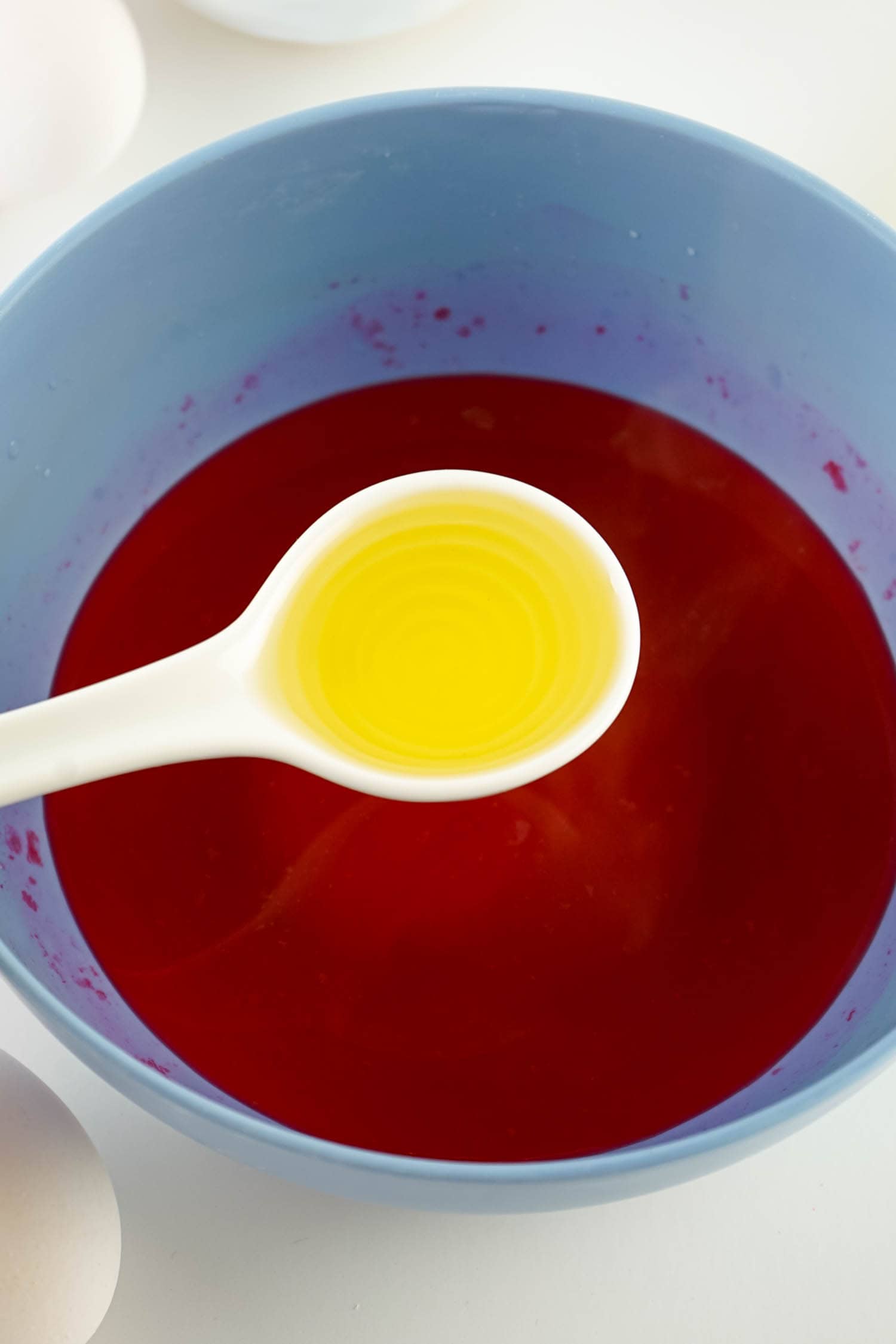 Add Cooking Oil to the Food Colored Water