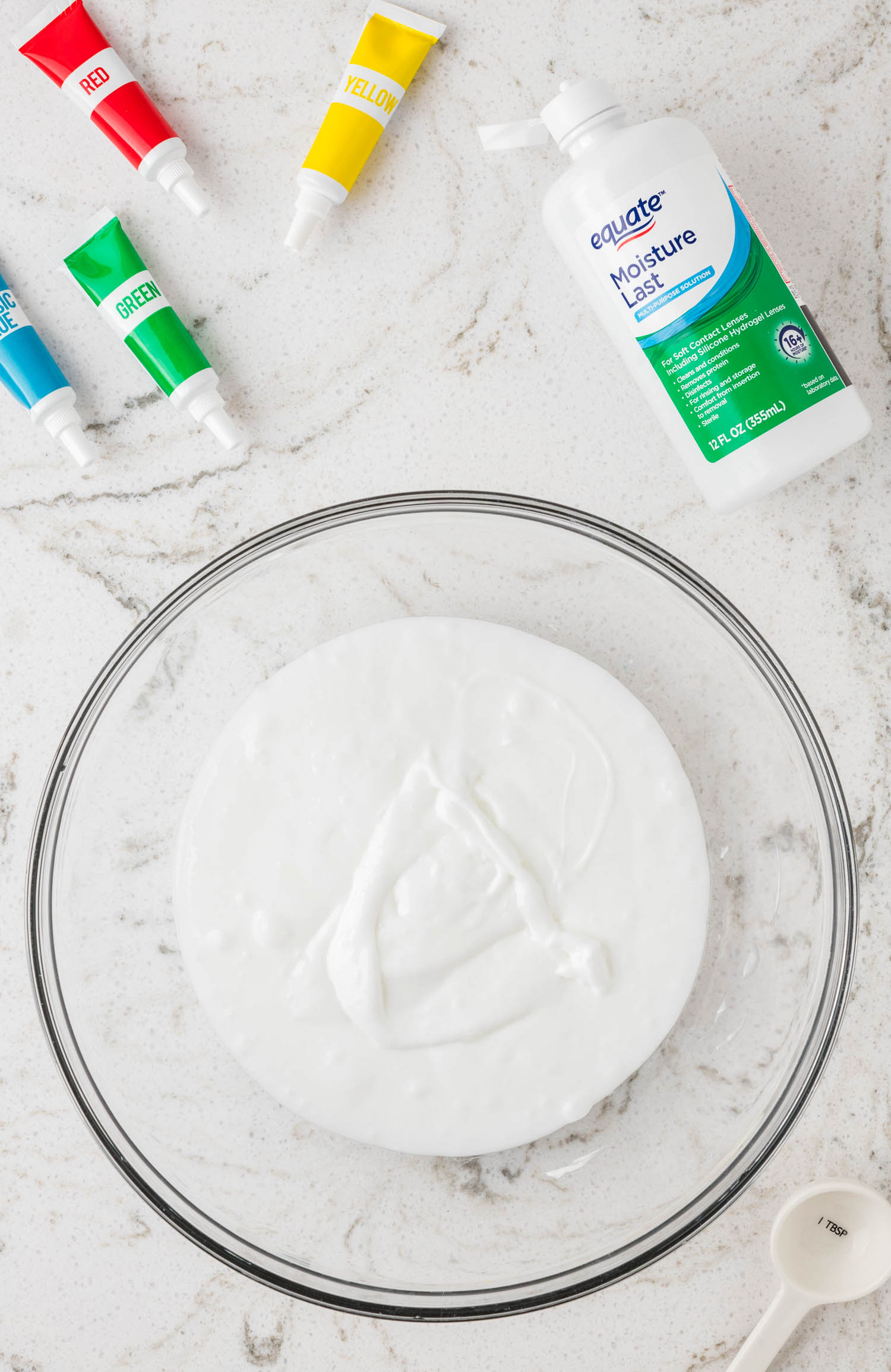 Add contact solution to the Glue and Knead together.