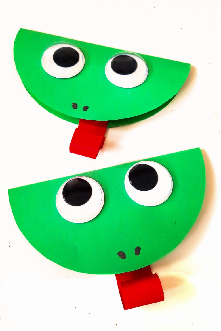 Overhead Image of two Completed Paper Frog Crafts