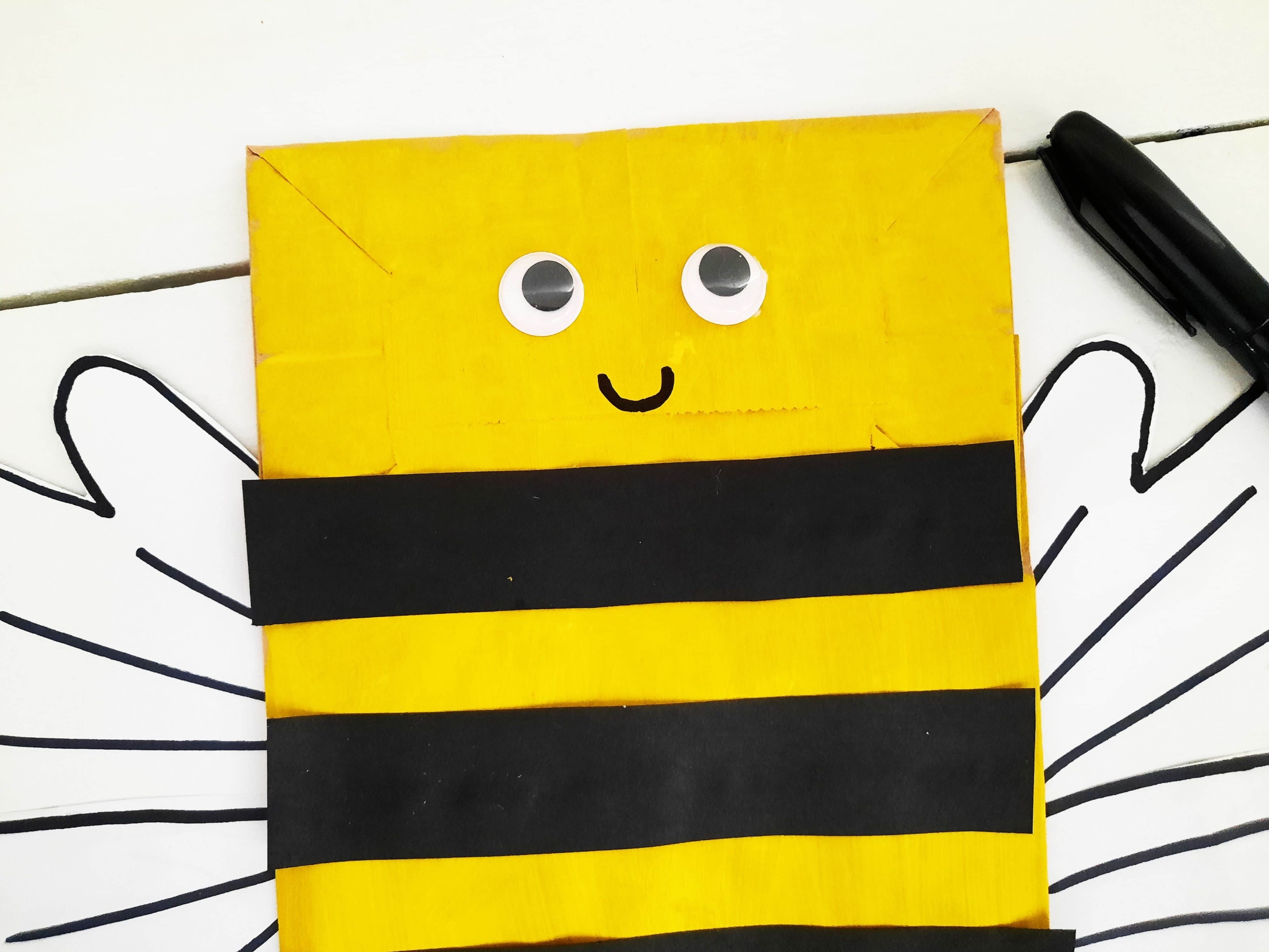 Add Googly Eyes and a Smiley Face to the Bee