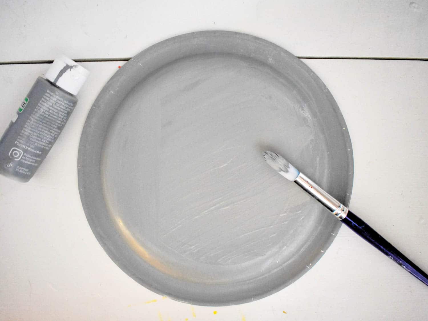 Start by painting the Bottom of the plate silver.
