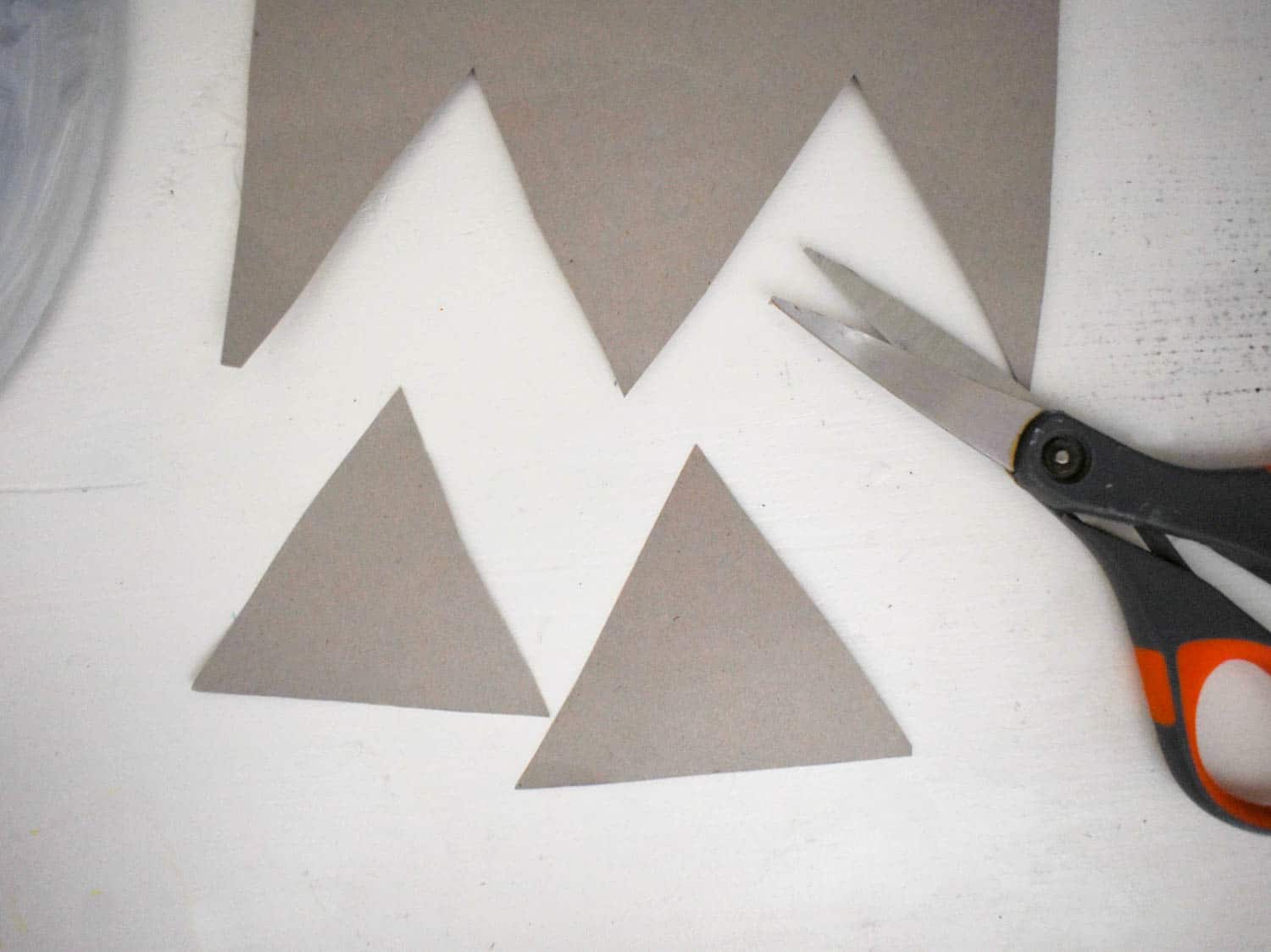 Cut out Triangles out of the silver cardstock for the Fin and Tail of the Shark