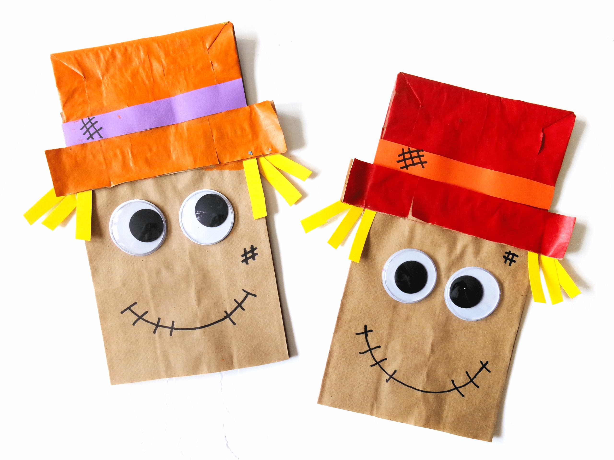 Two completed Paper bag Scarecrows.