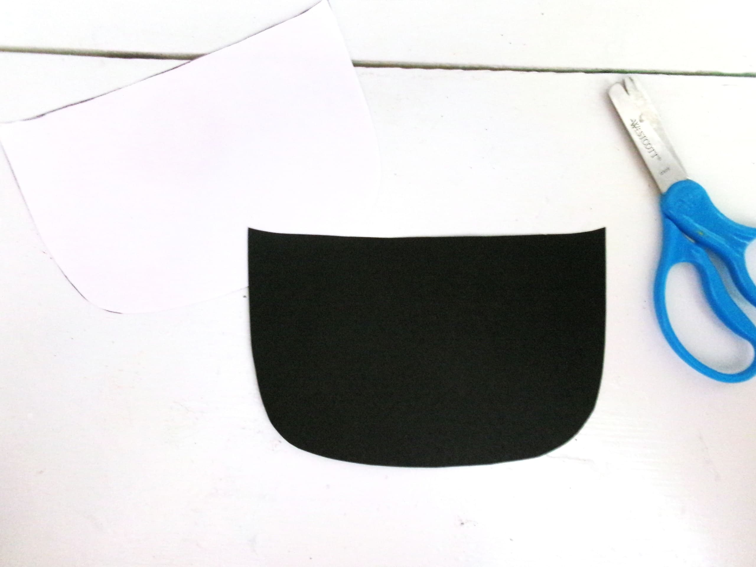 Trace the Pot Template on Black Cardstock and Cut Out.