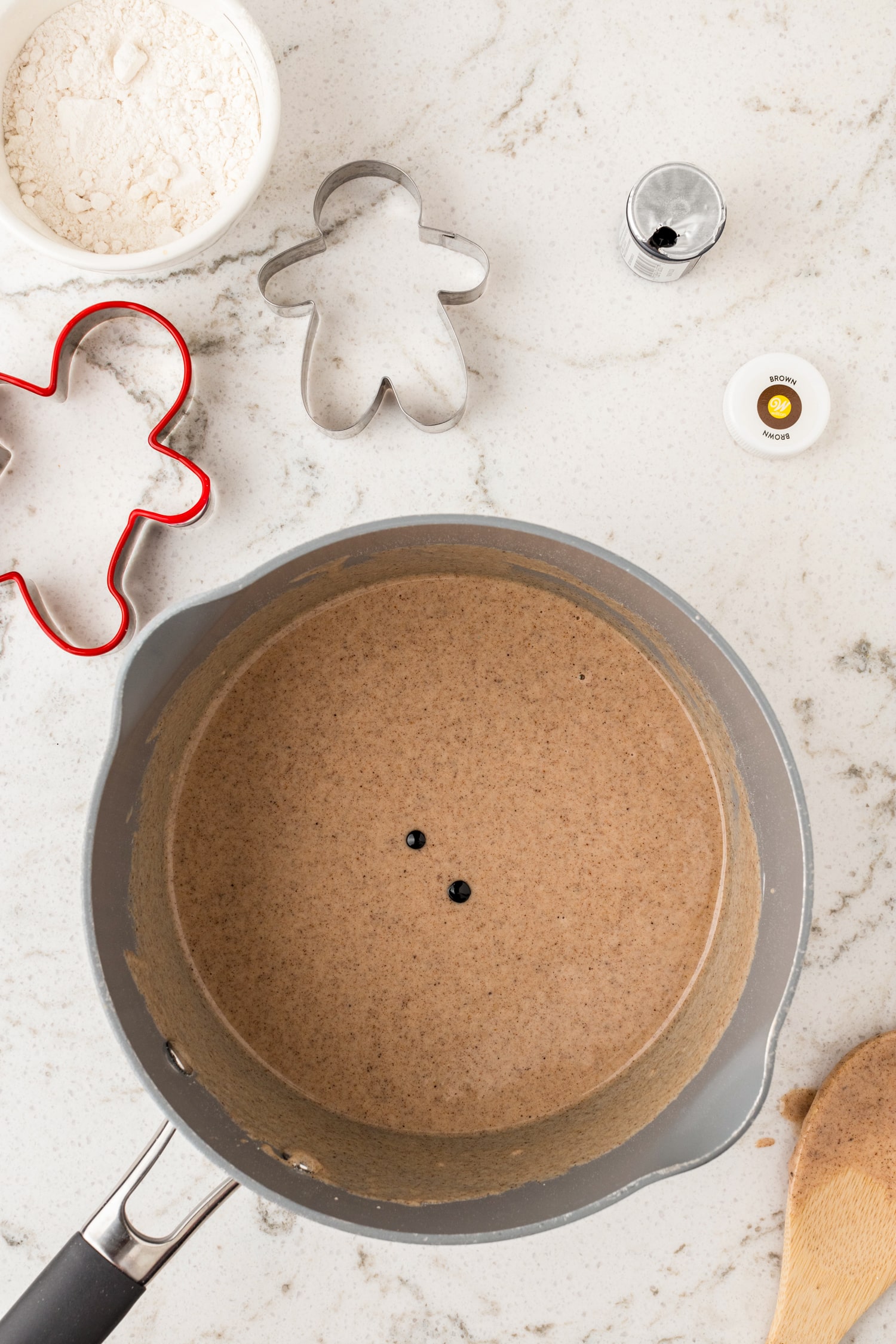 Add in a couple drops of food coloring if you'd like. Stir over Medium heat until it forms to playdough.