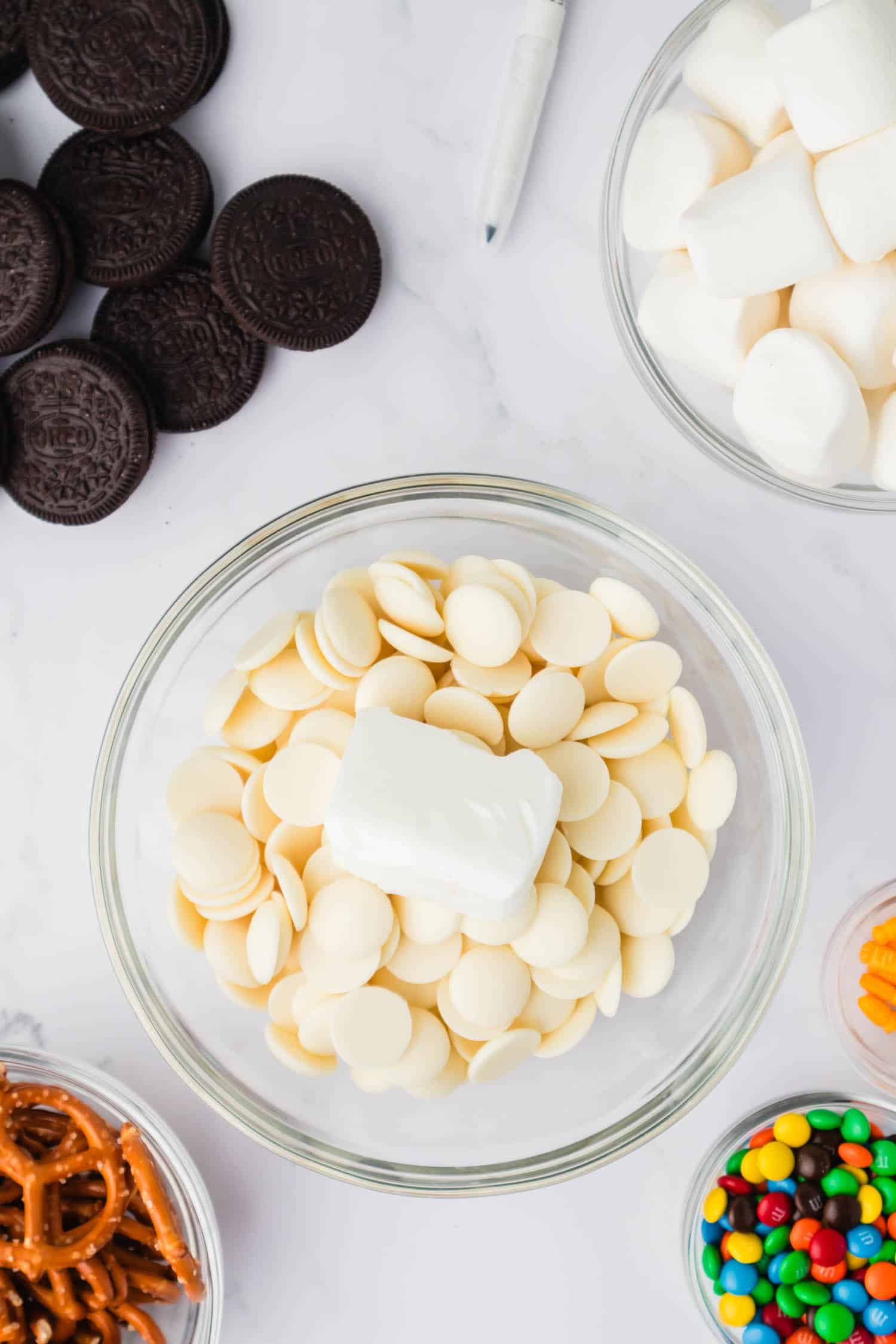 Combine Chocolate and Shortening in a Microwave Safe Bowl. Stir Constantly until Melted Completely.