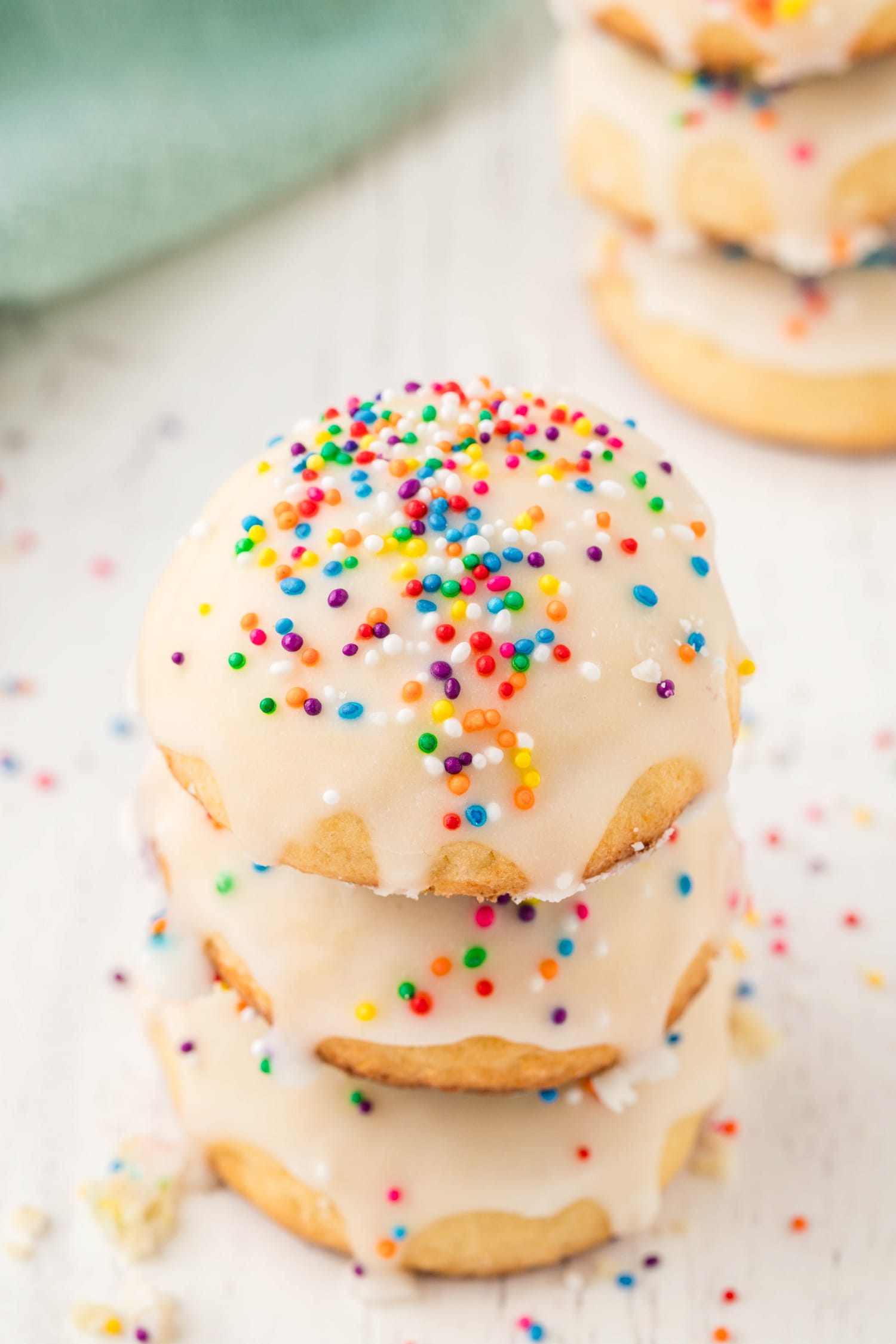 Three Ricotta Cookies Stacked on top of each other.