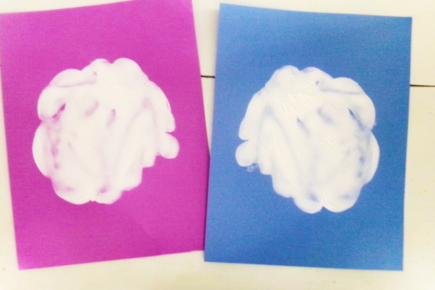 White paint smashed on paper