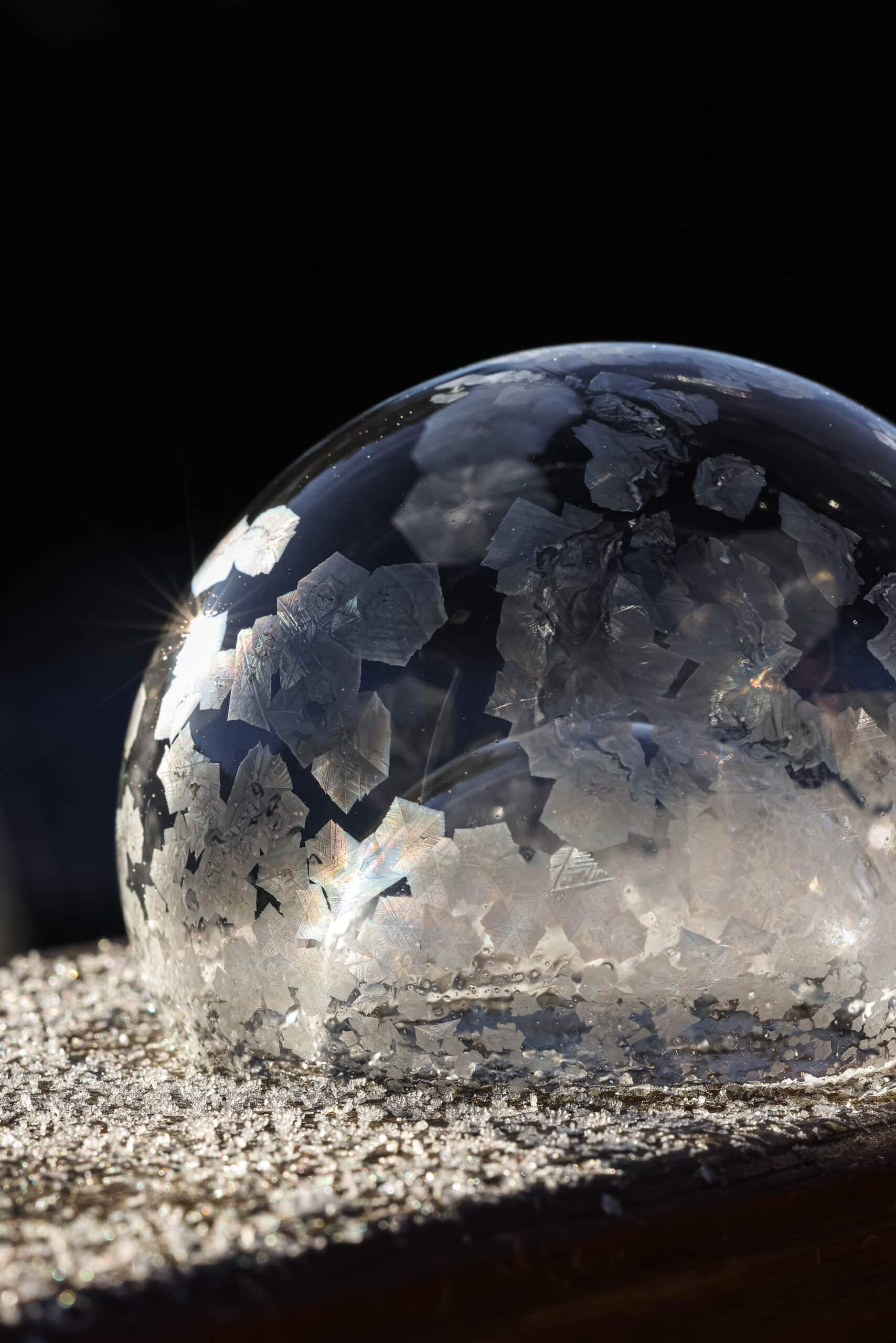 A close up of a frozen bubble.