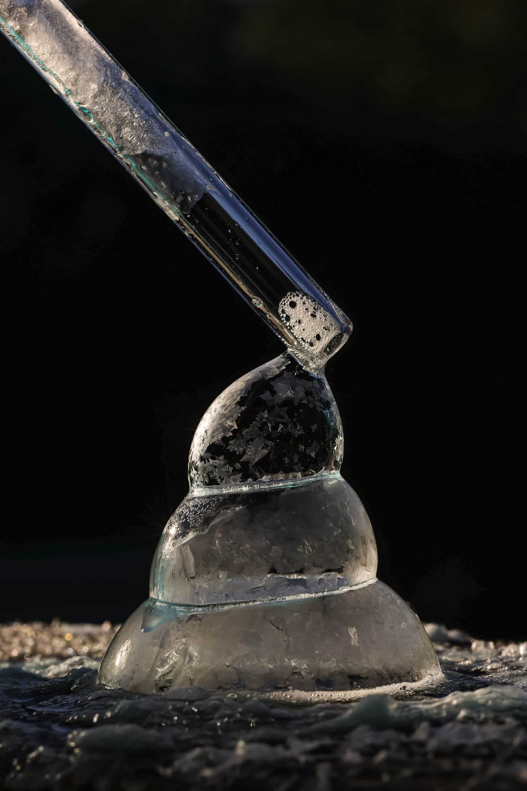 When the weather is 20 degrees or colder, take your bubble mixture and straw outside. blow bubbles and let them freeze.
