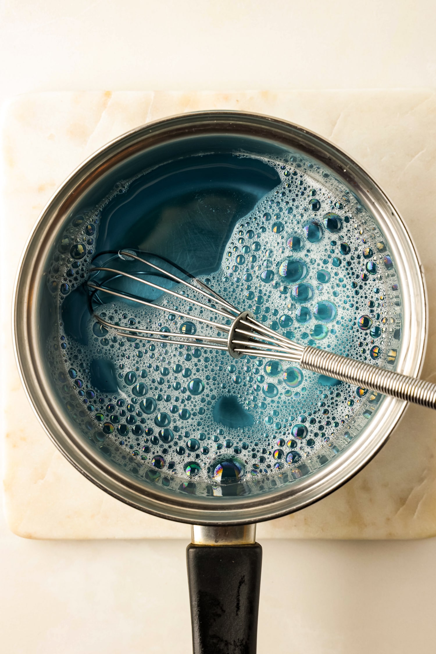 Add dish soap to the sweet water mix.