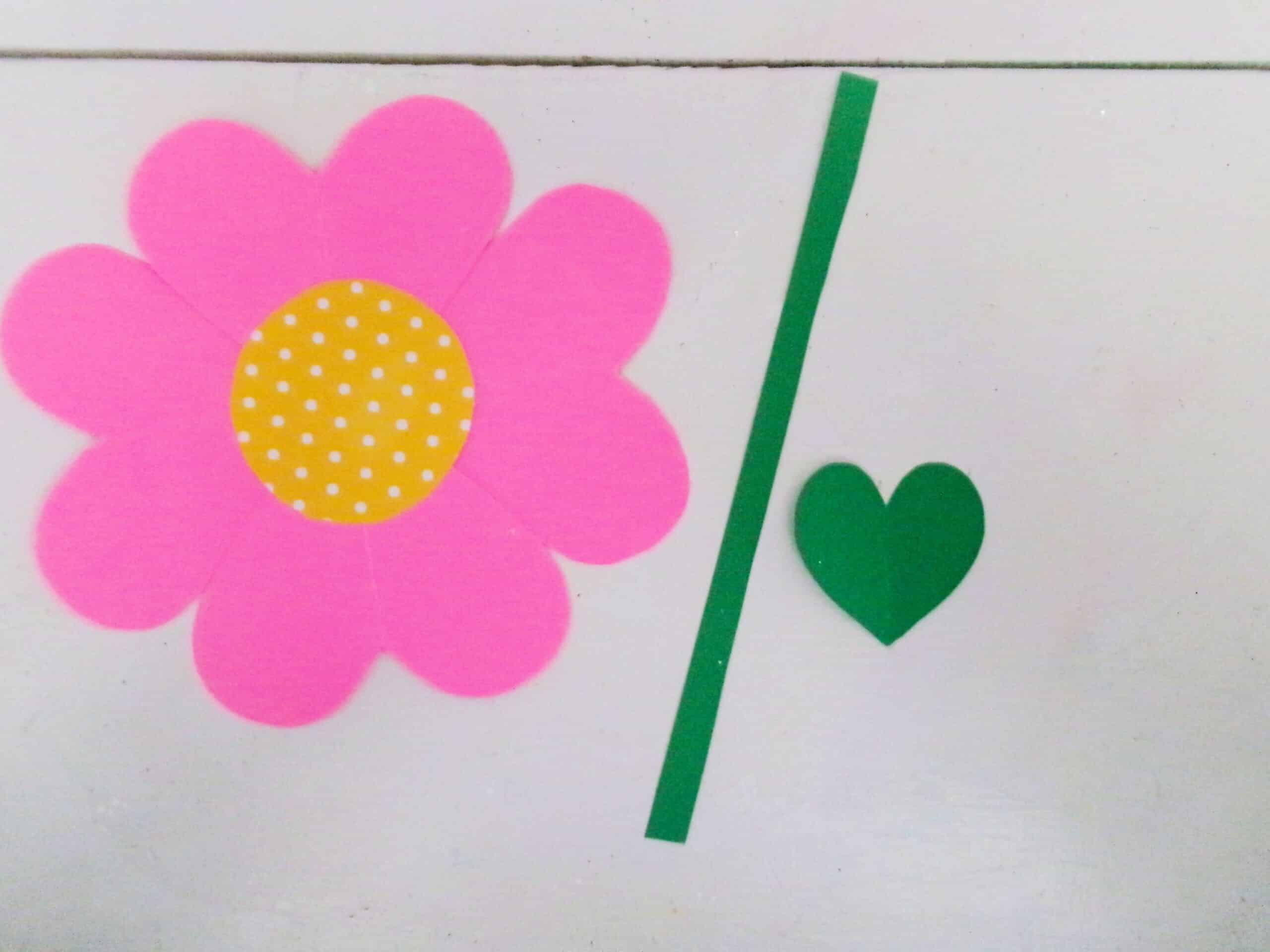 Then cut a stem and another heart from green cardstock paper.