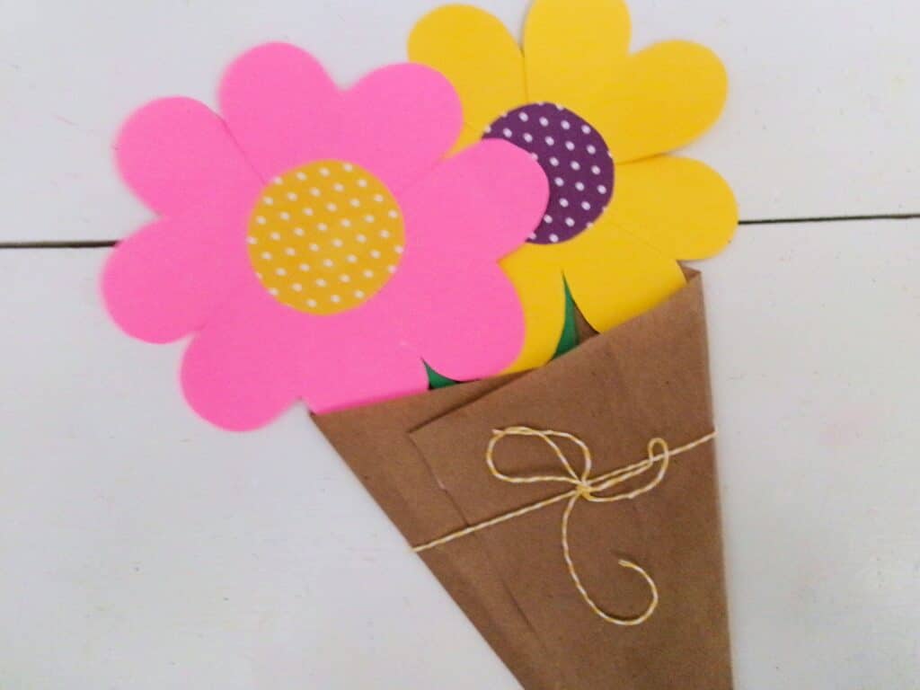 Now insert the flowers into your wrap.