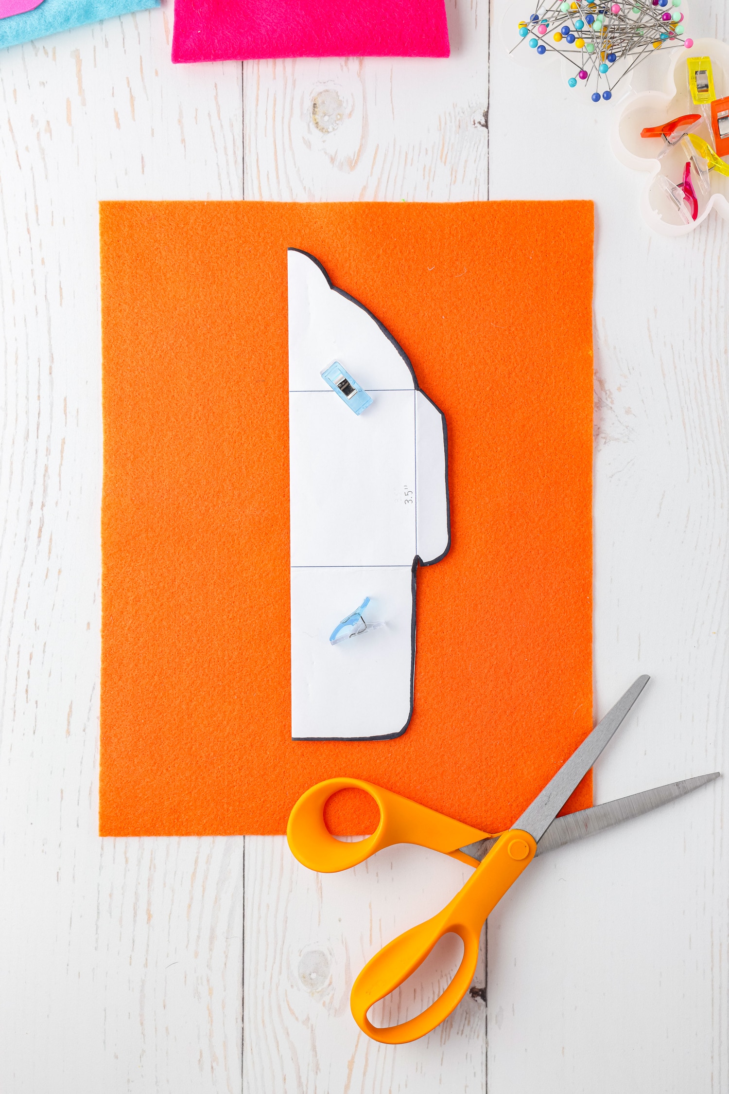 Cut out the envelope pattern & fold in half. Grab a sheet of felt paper.