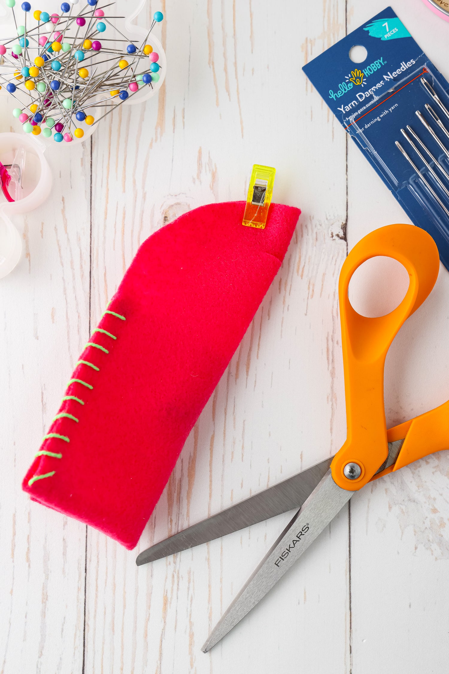 Cutting button hole in felt envelope