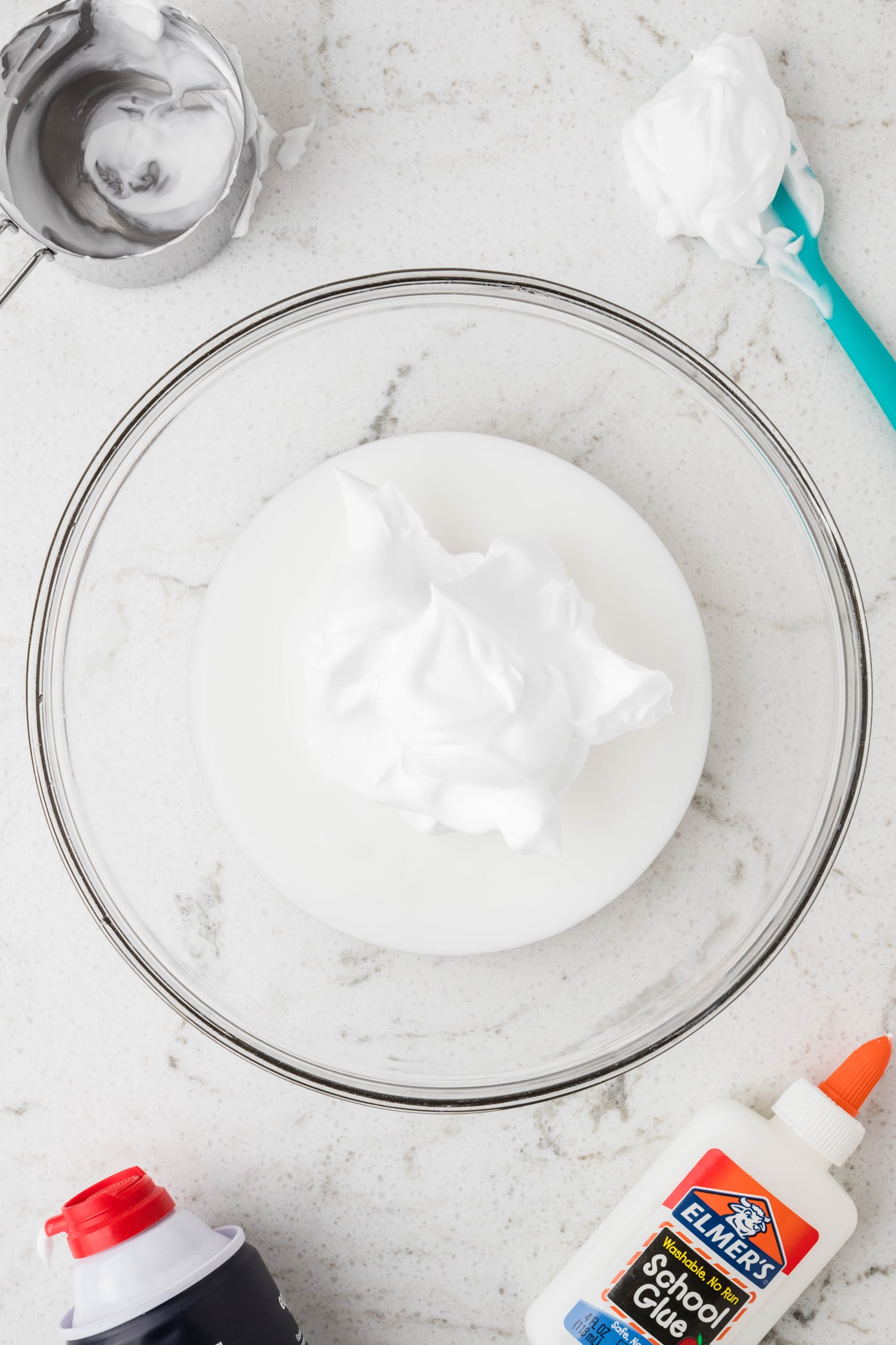Mix the White School glue and shaving cream until combined.