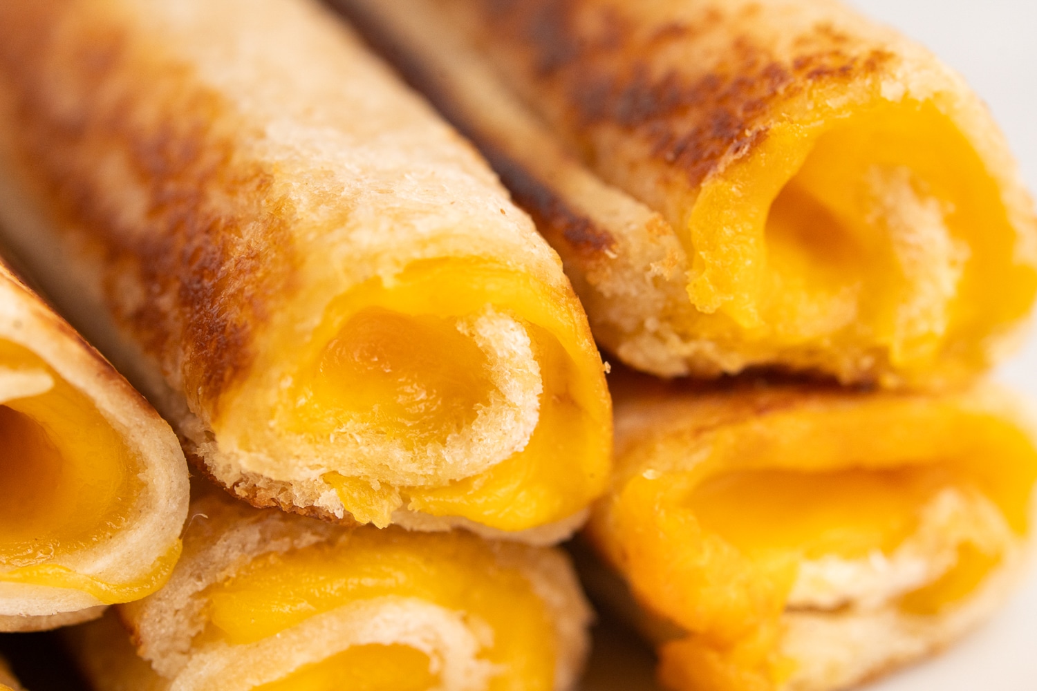 Close up photo of completed grilled cheese roll ups