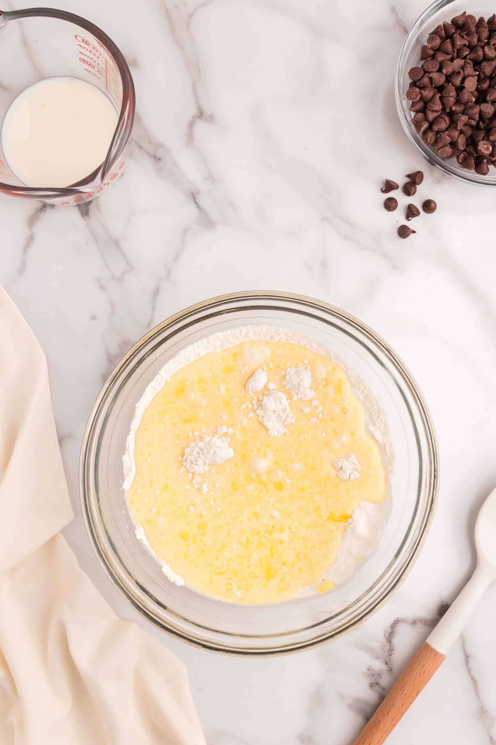 Add dry ingredients to wet ingredients and mix until moistened.