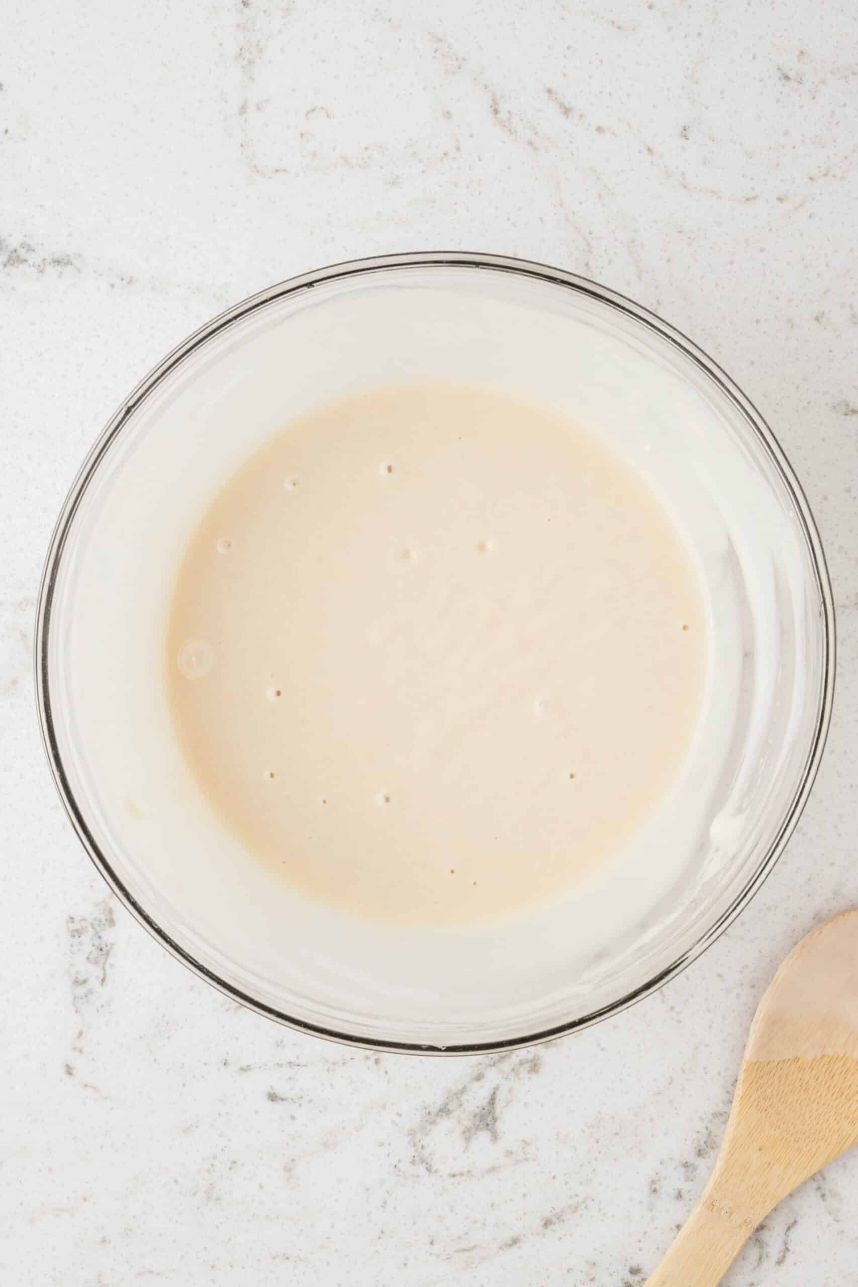 Mixture ready to be divided into separate bowls for food coloring.