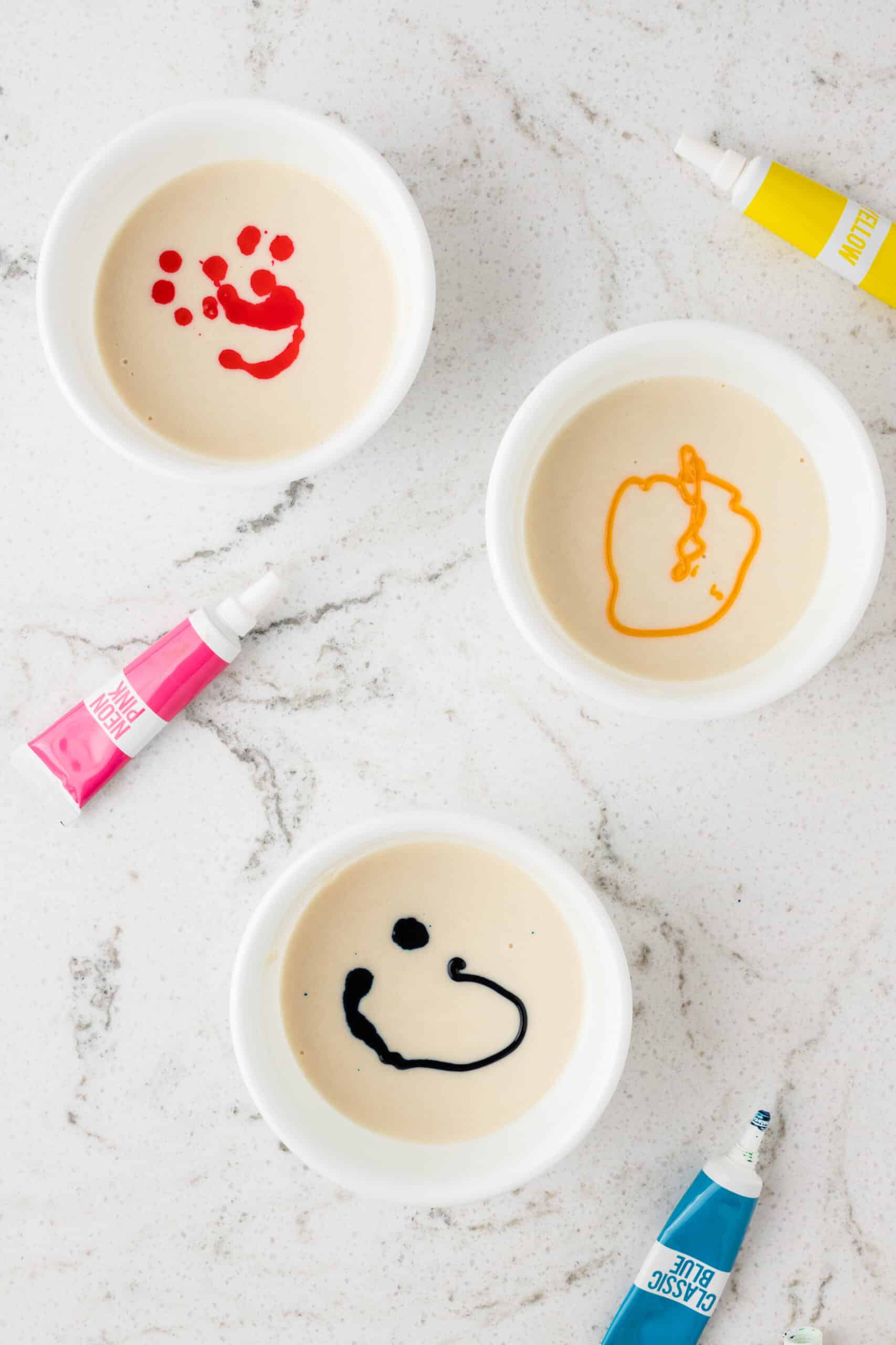 Divide dough into separate bowls and add food coloring.