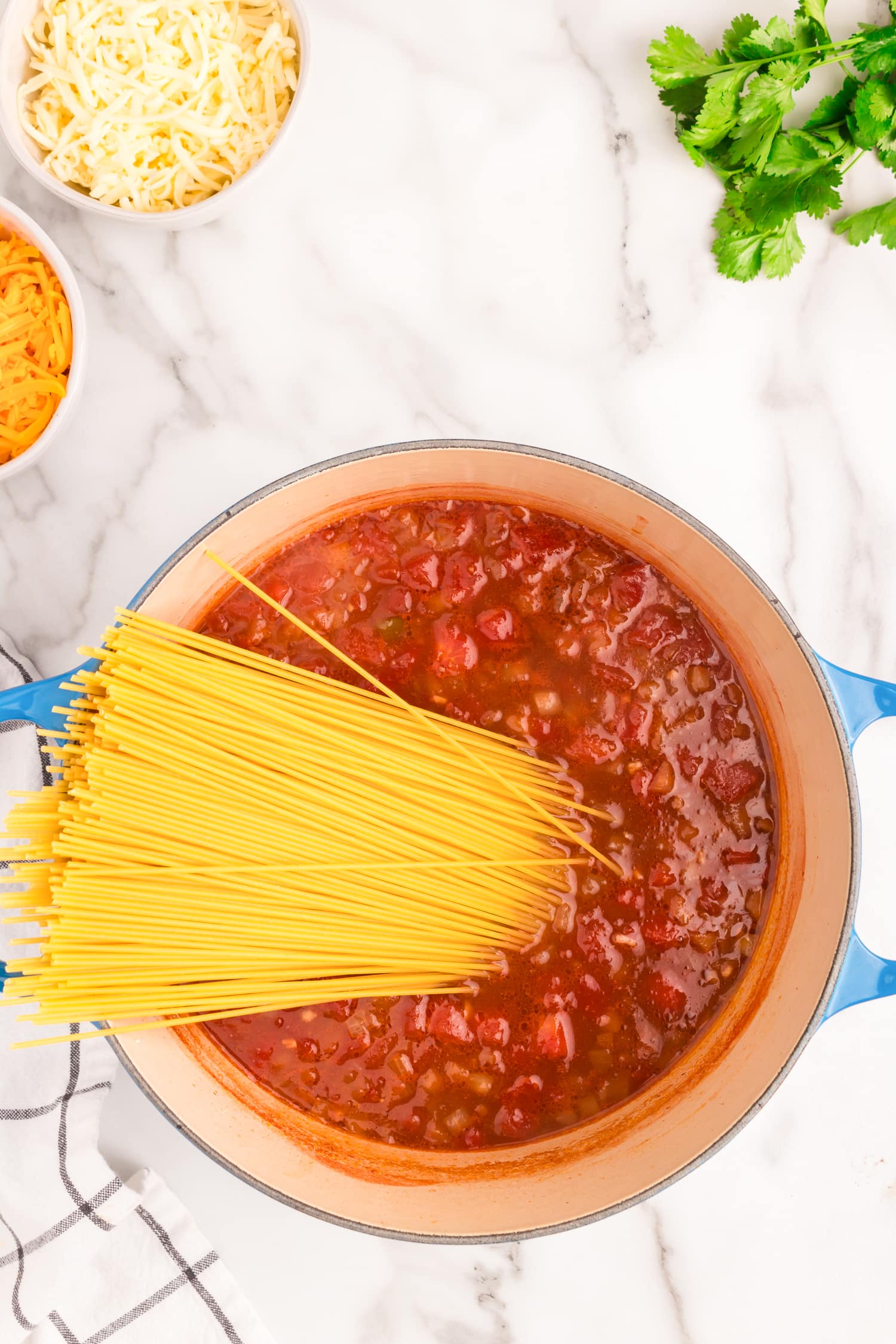 Add in the noodles. Cook for 15-18 minutes or until noodles are tender. stir frequently.