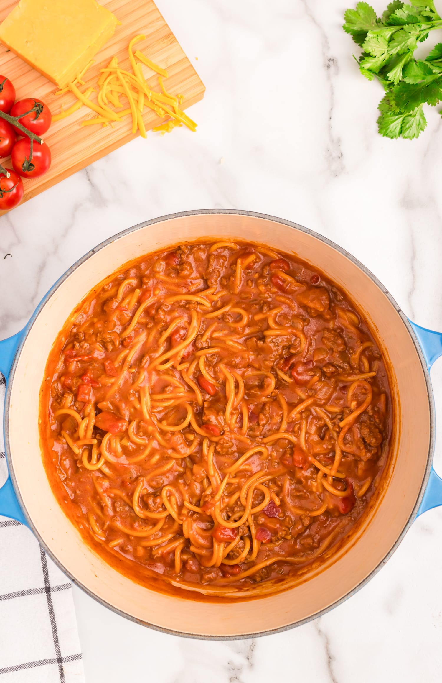 Complete Taco Spaghetti in a dutch oven.