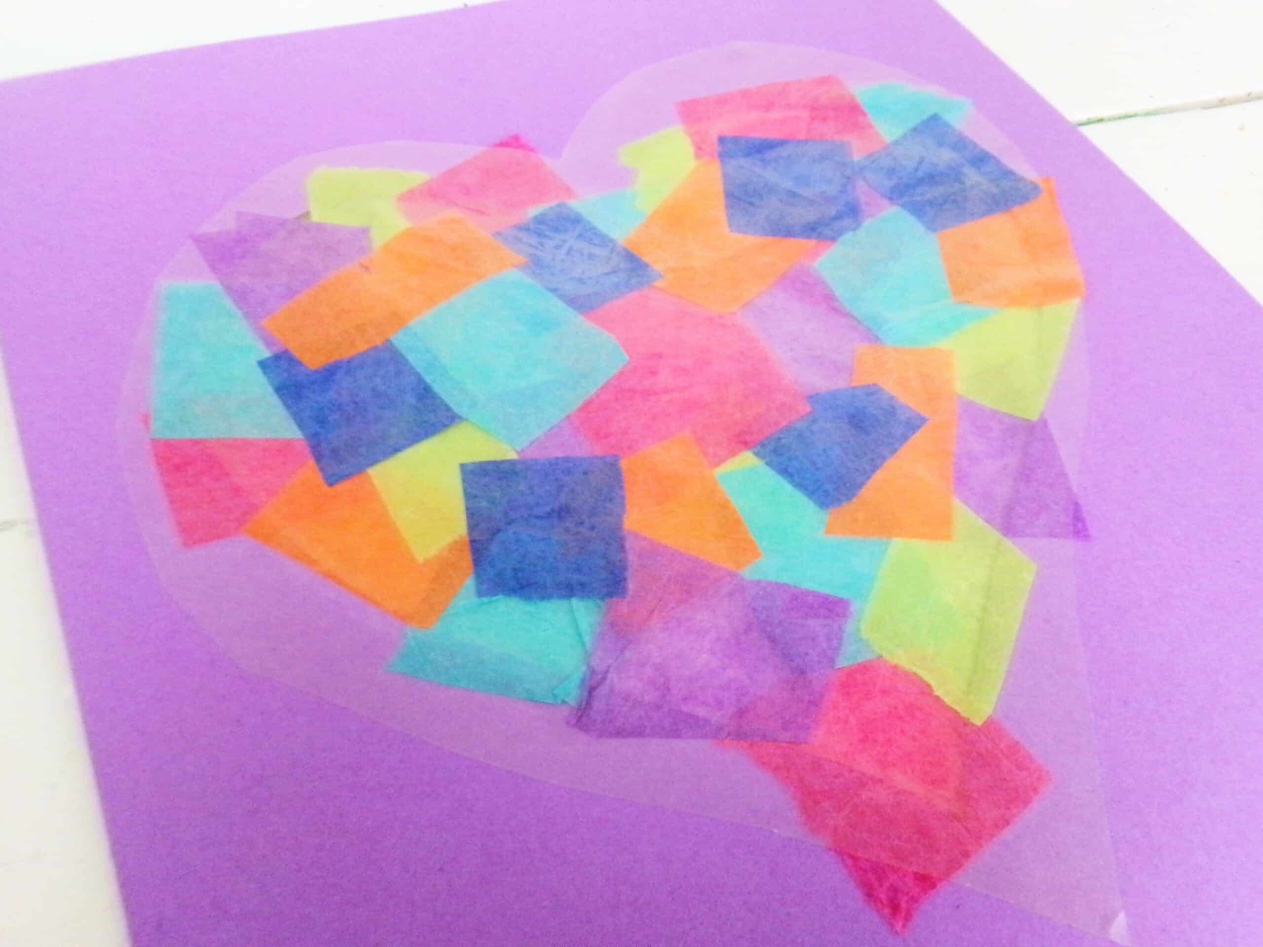Once the heart is full of color add the 2nd sheet of contact paper on the back of the i love you to pieces card.