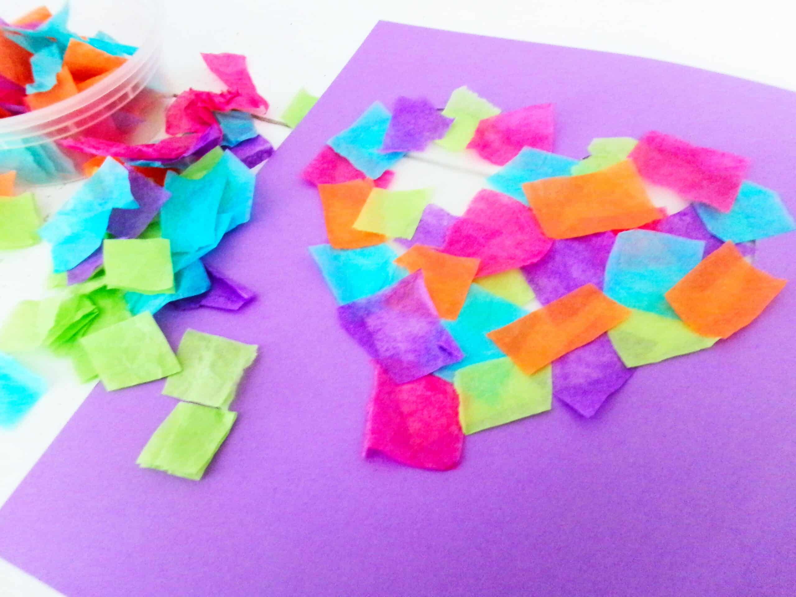 Apply tissue paper squares until they cover the whole heart.