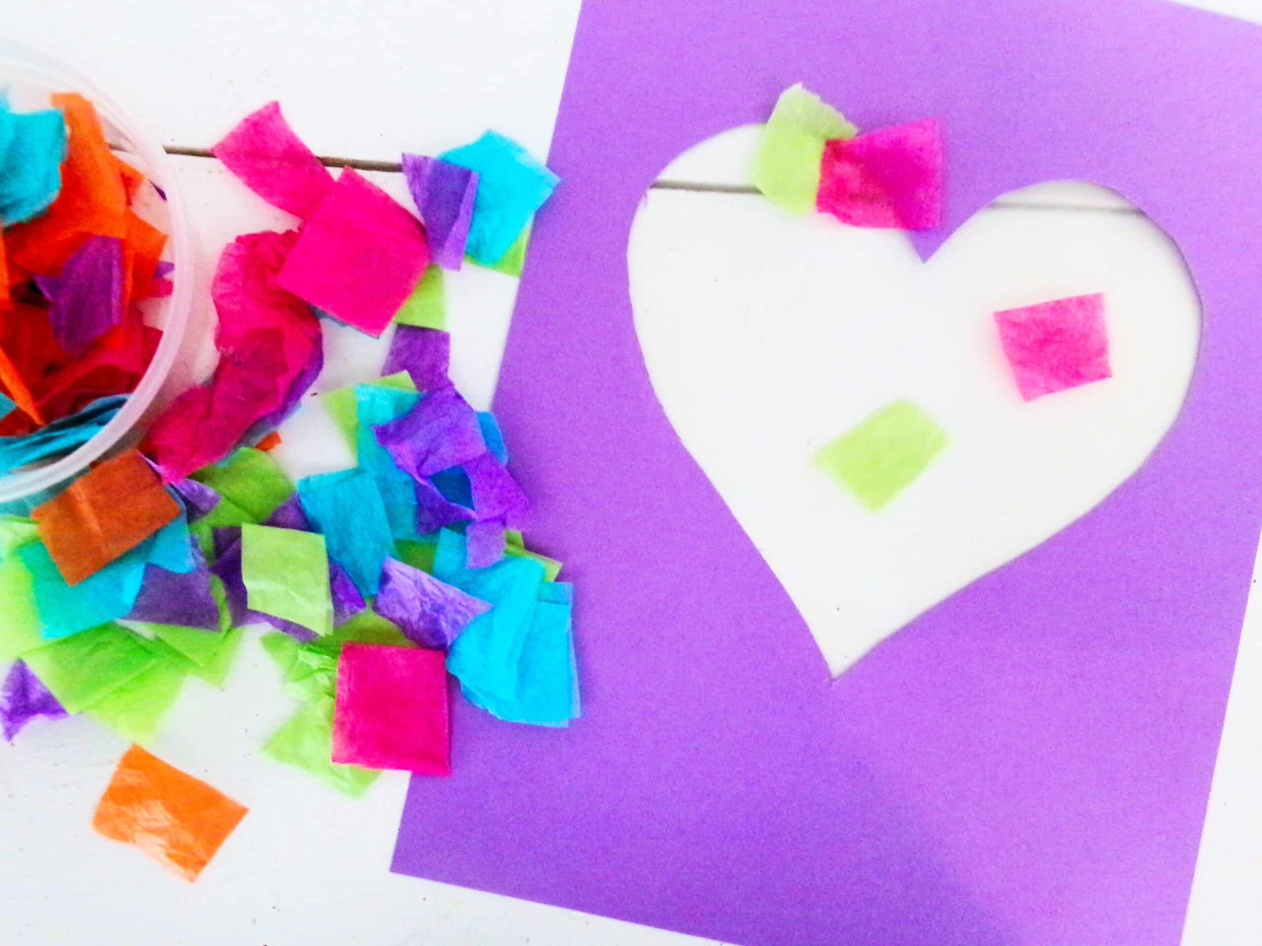 Cut or rip up pieces of tissue paper to be added to the sticky side of the contact paper.