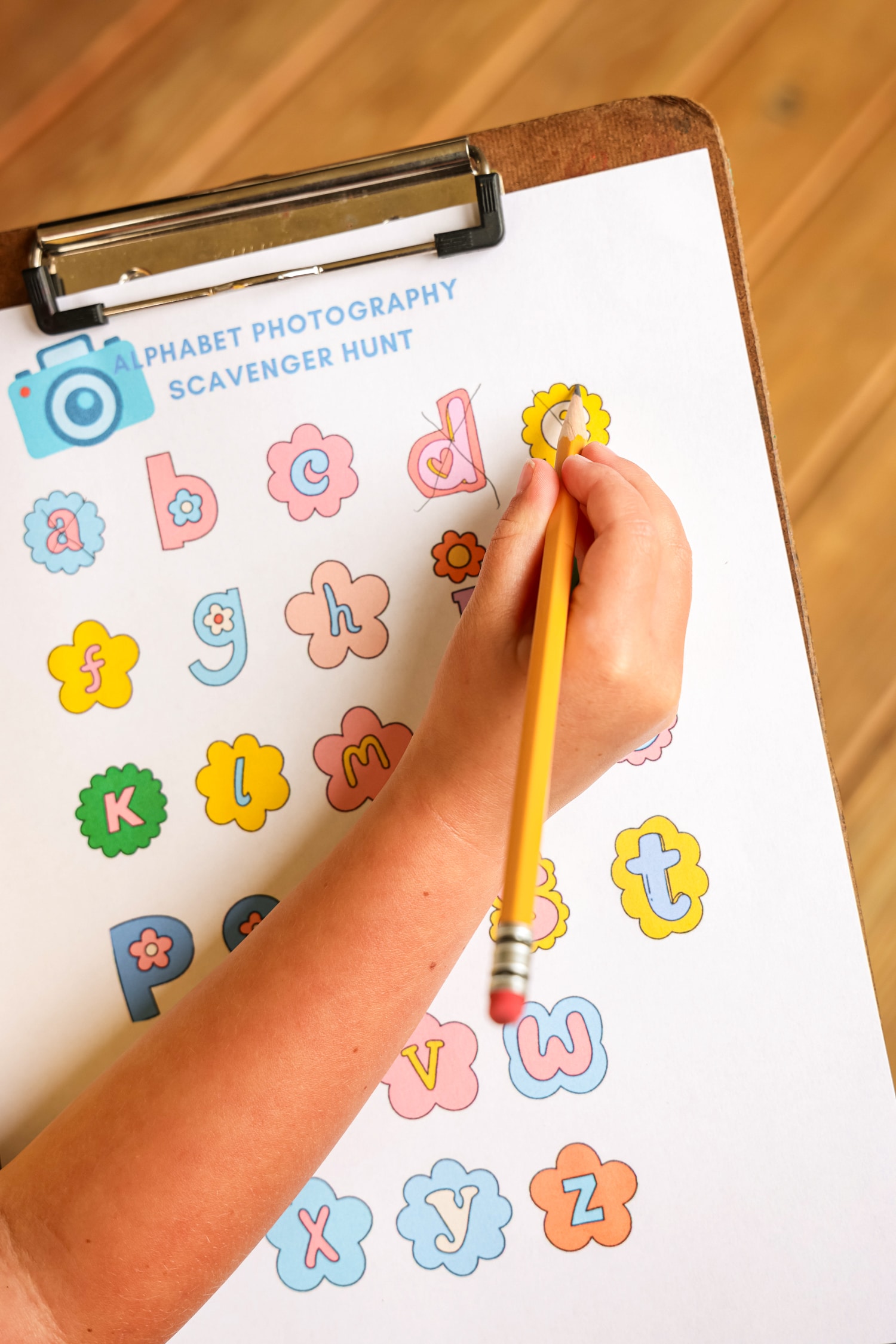 Cross the letter off of the ABC checklist so you know which letters you have.