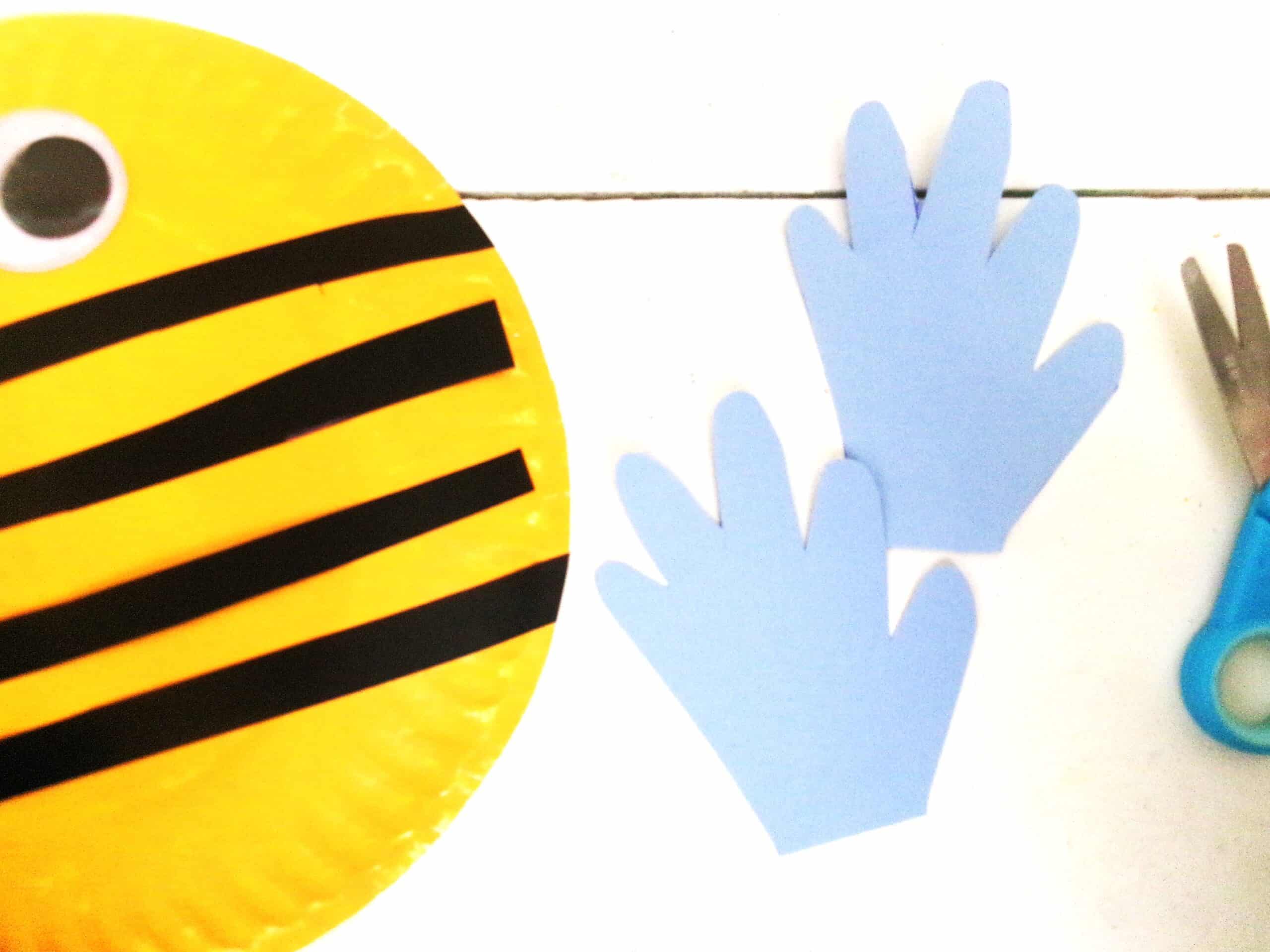 Trace hands on light blue cardstock and cut out.
