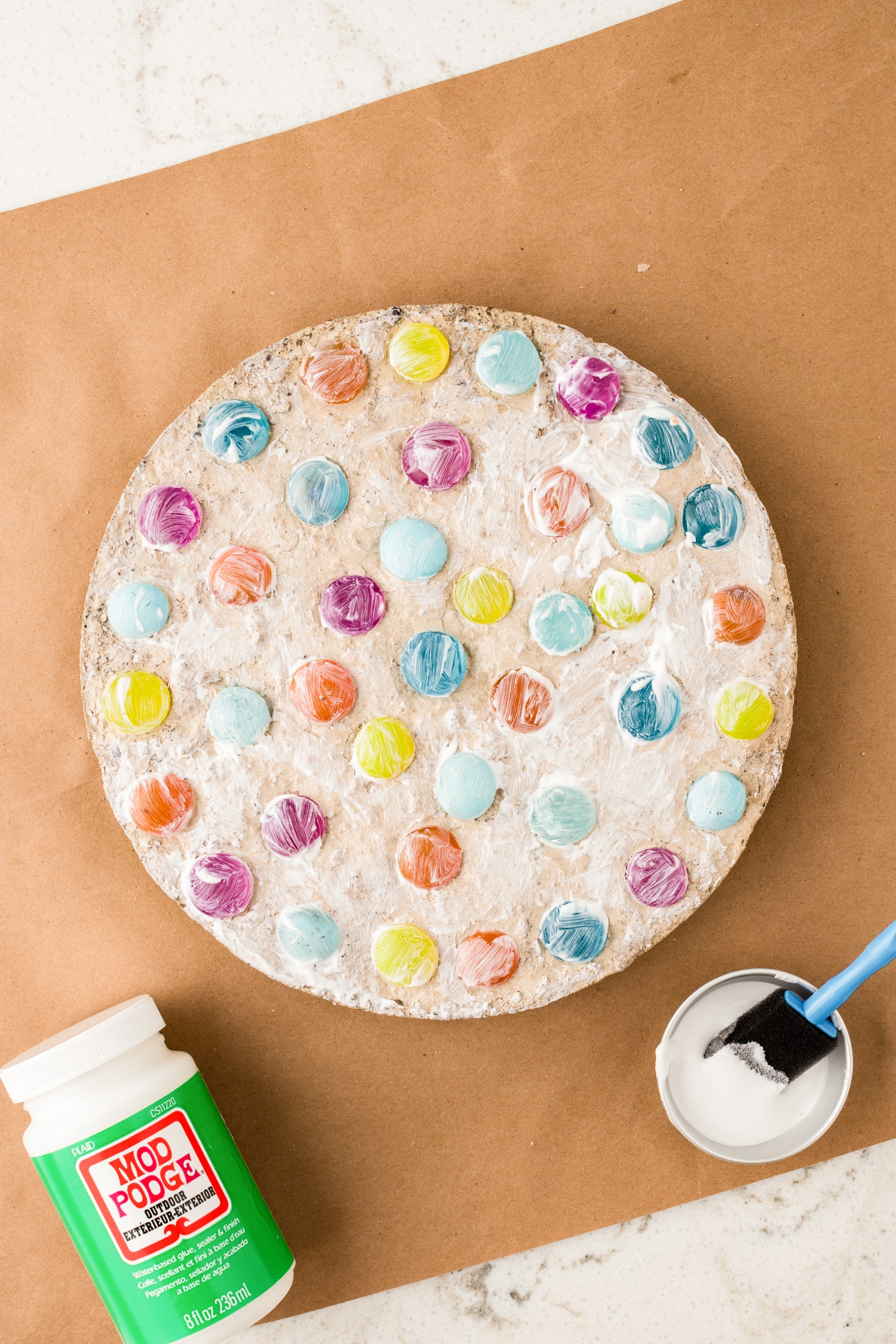 To seal apply a coat of outdoor mod podge over its entire surface.