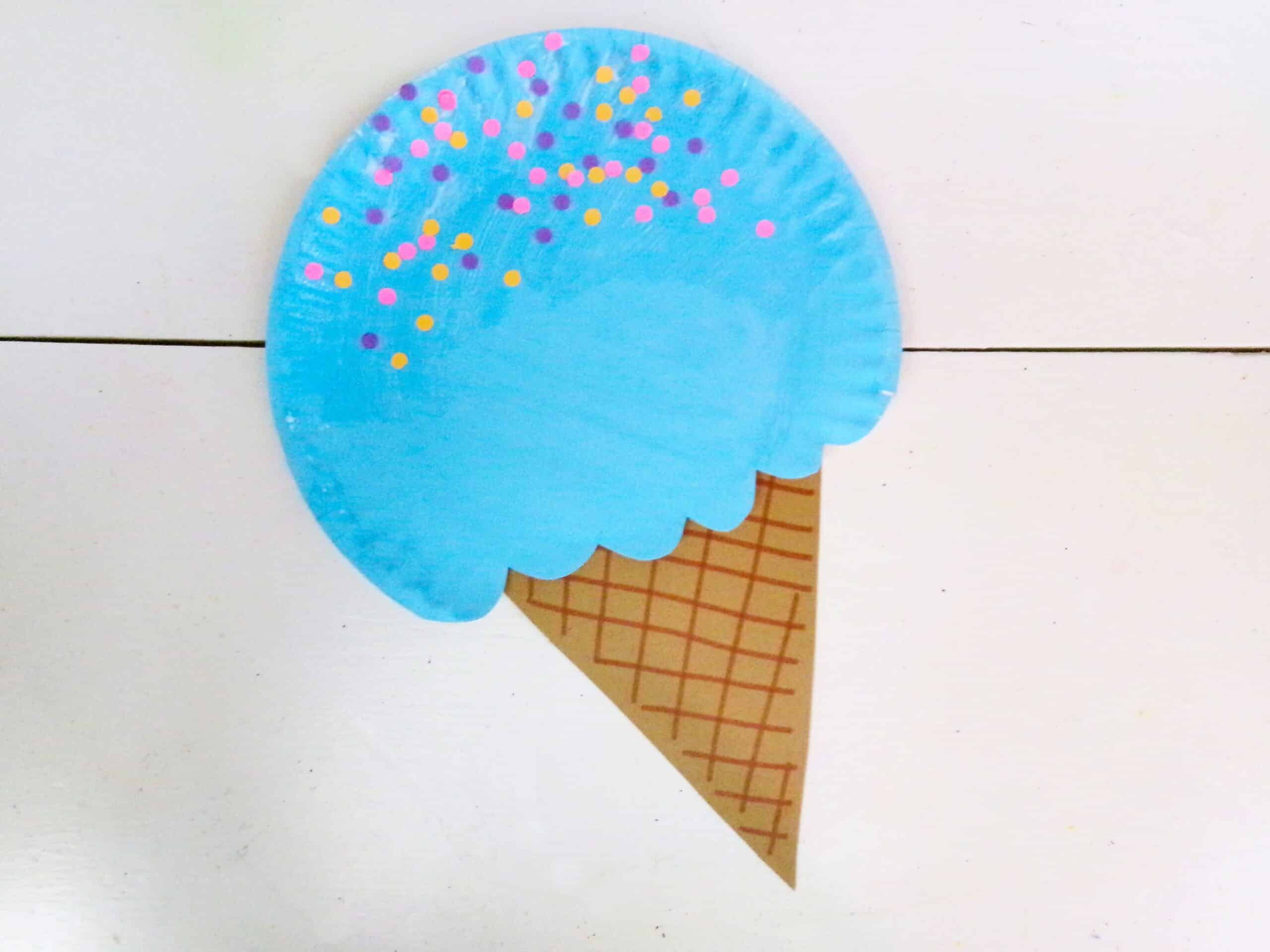 Finally glue the cone to the bottom of the paper plate making a ice cream cone.