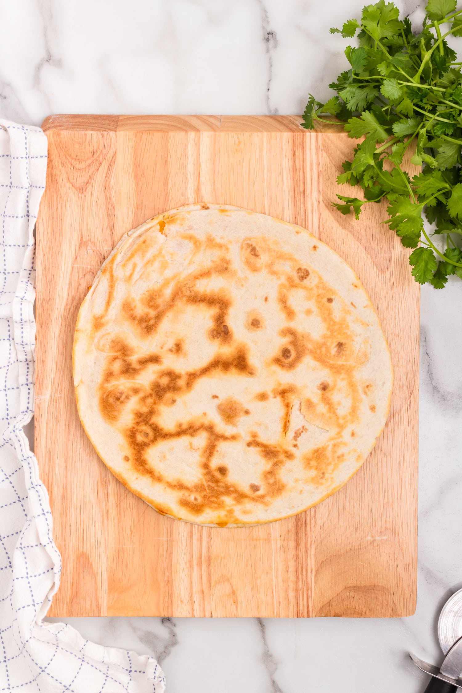 Cheese Quesadilla on cutting board