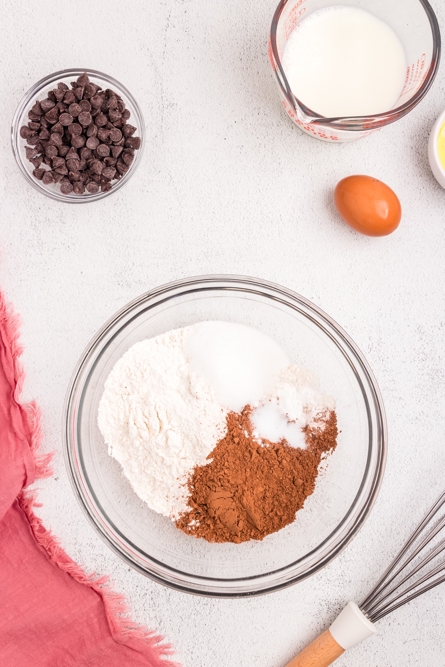 Dry ingredients for Chocolate Pancakes in glass mixing bowl