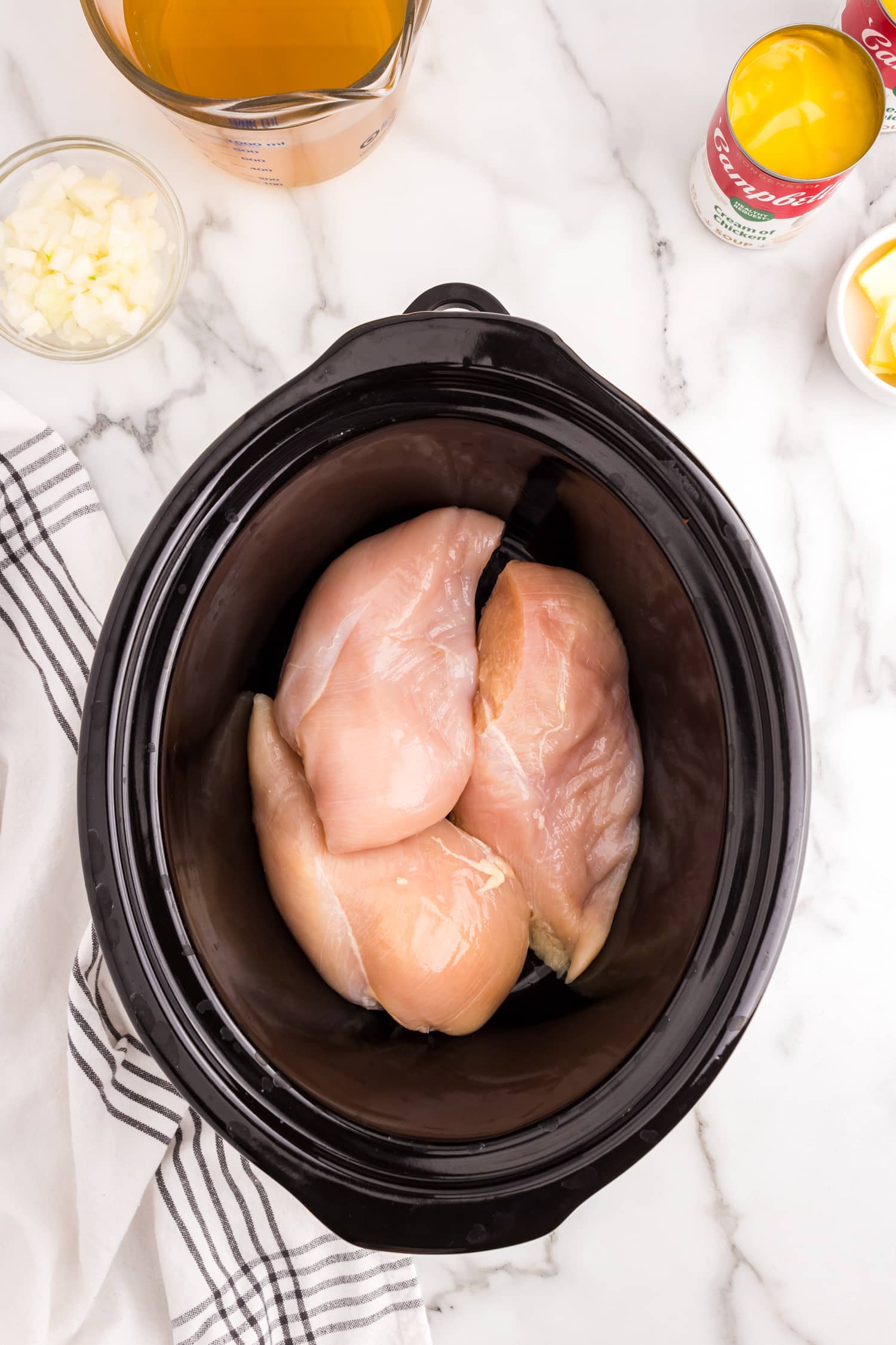 Chicken breasts in crock pot for Crock Pot Chicken and Noodles recipe