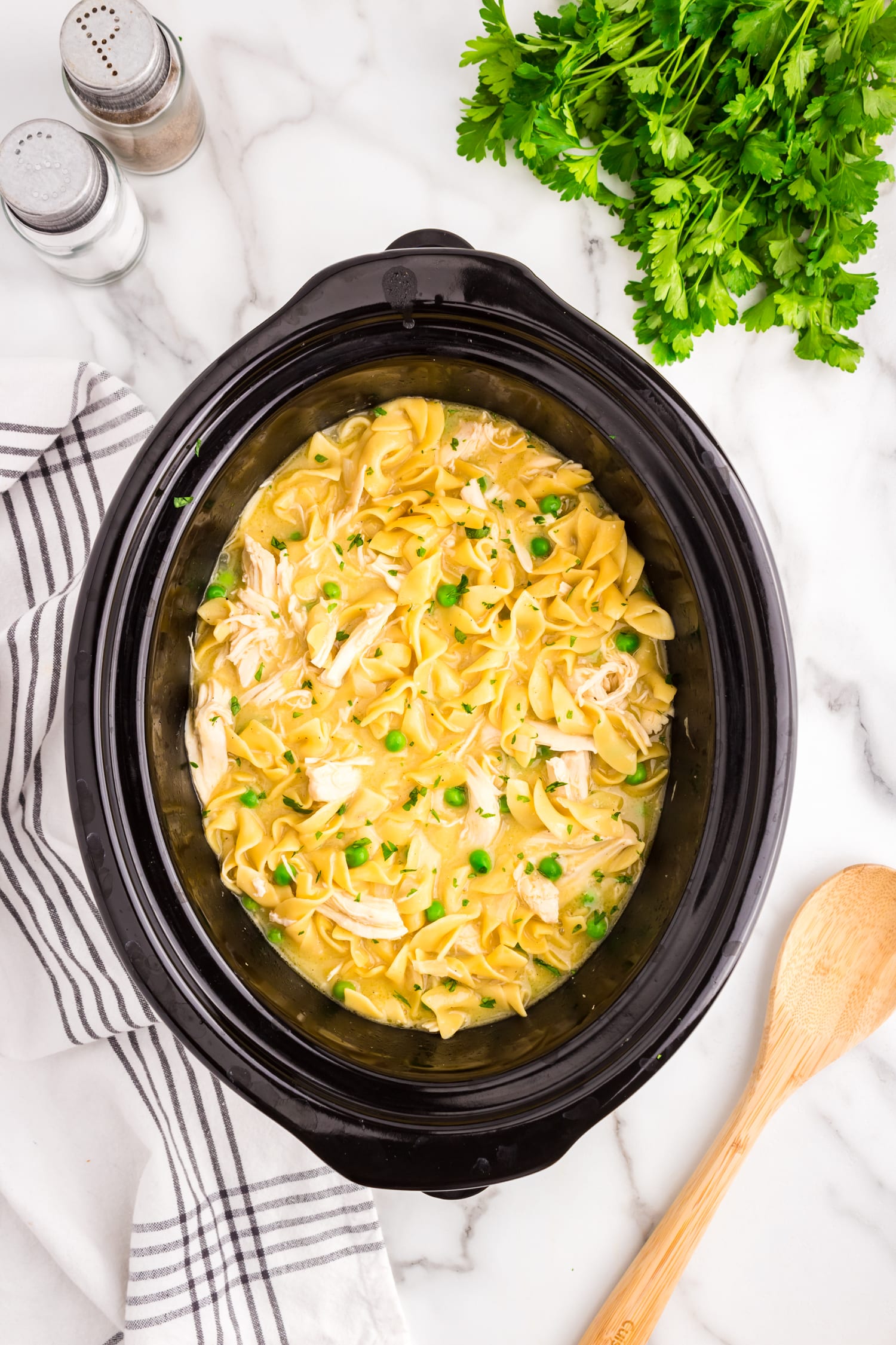 Slow Cooker Chicken and Noodles reacdy to enjoy