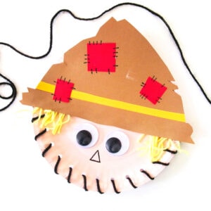 Closeup square image of Paper Plate Scarecrow Craft