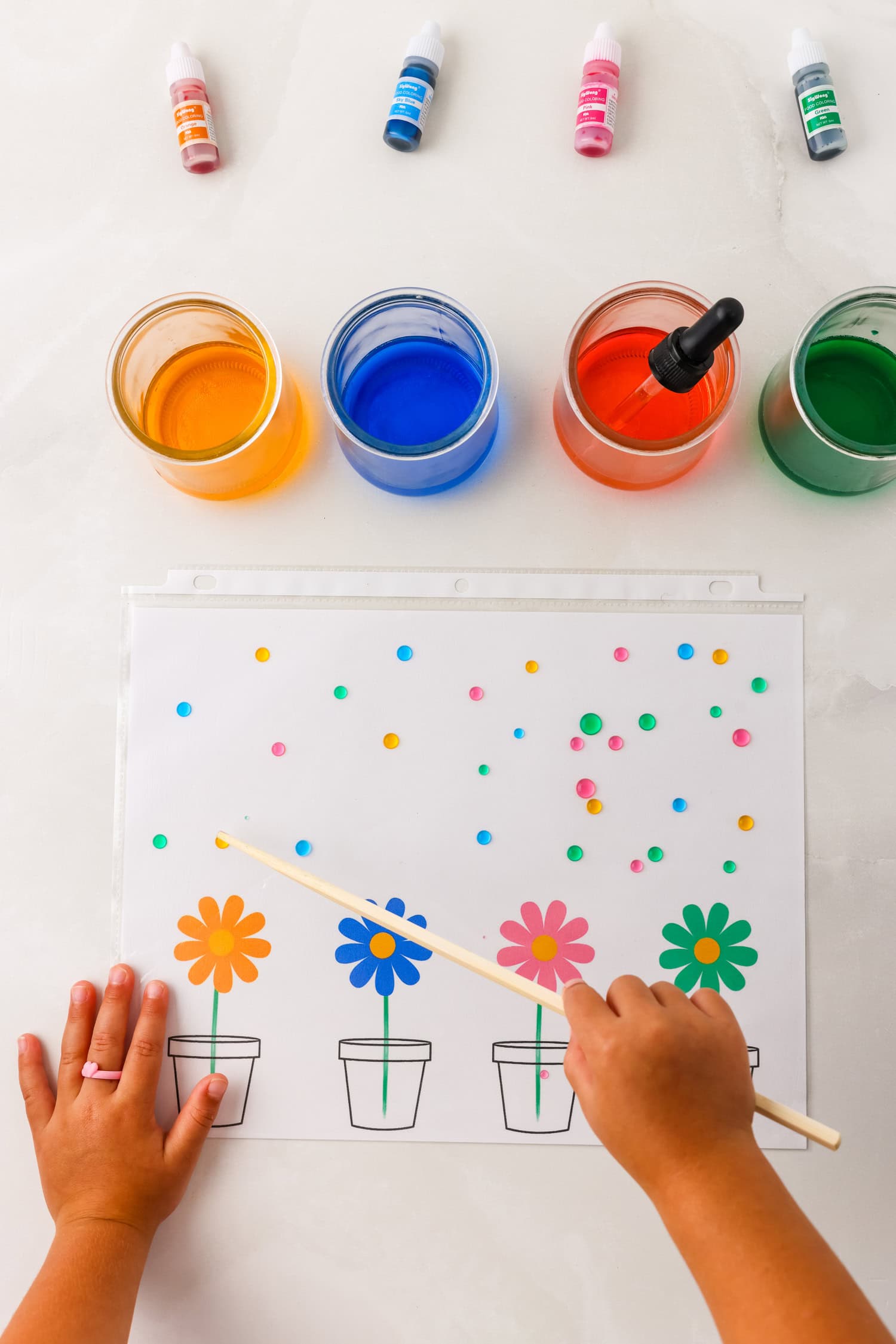 Using a chopstick to do the Color Matching Activity