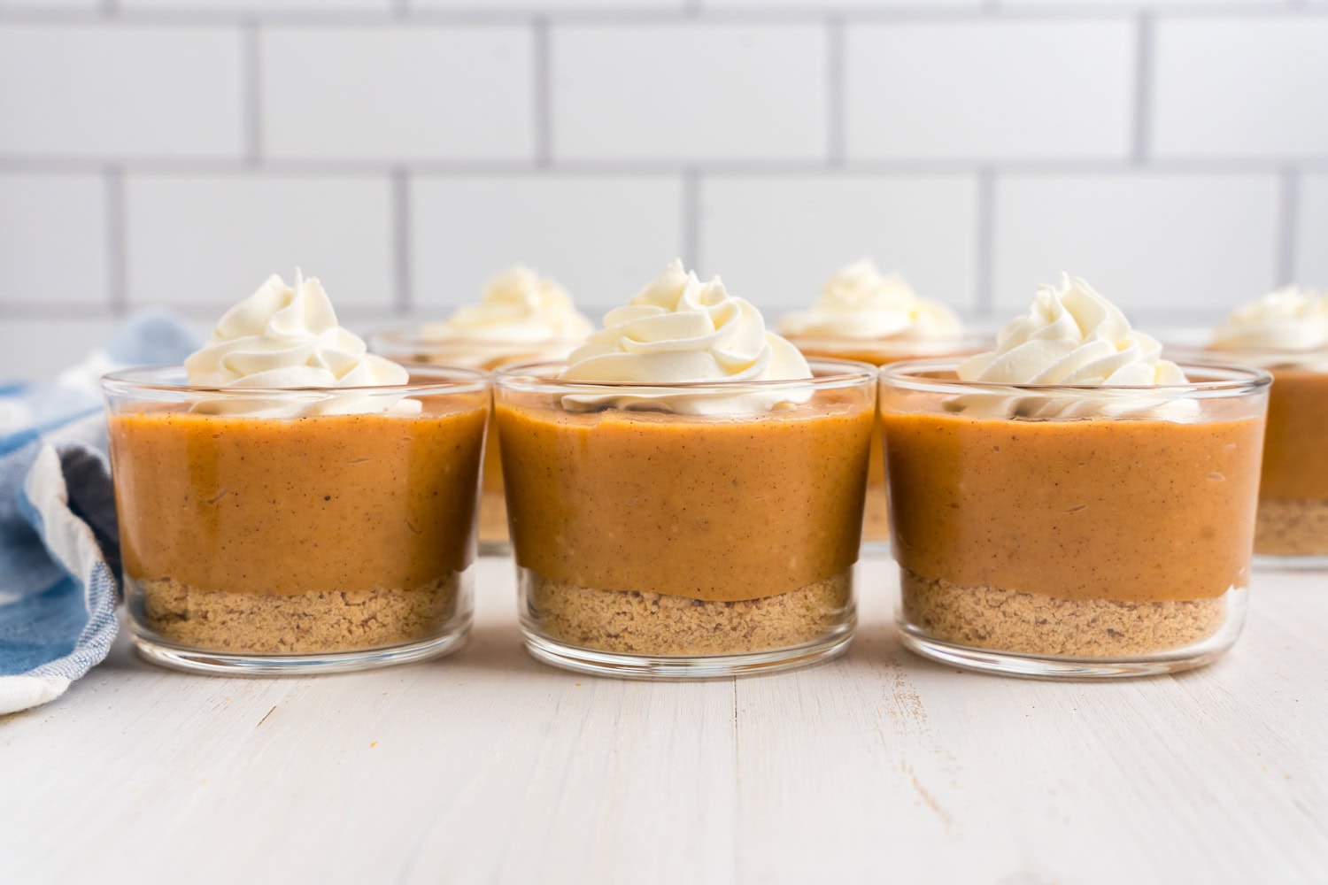 Pumpkin Pie in a Bag recipe in small glass serving cups arranged on counter