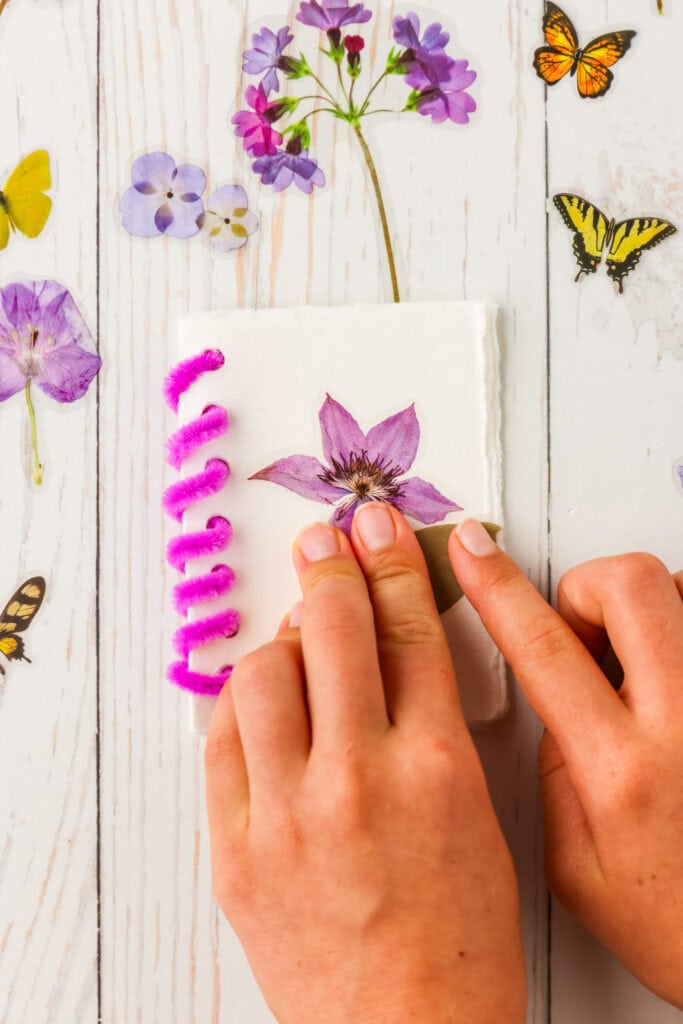 Adding a sticker to the DIY Sticker Book cover