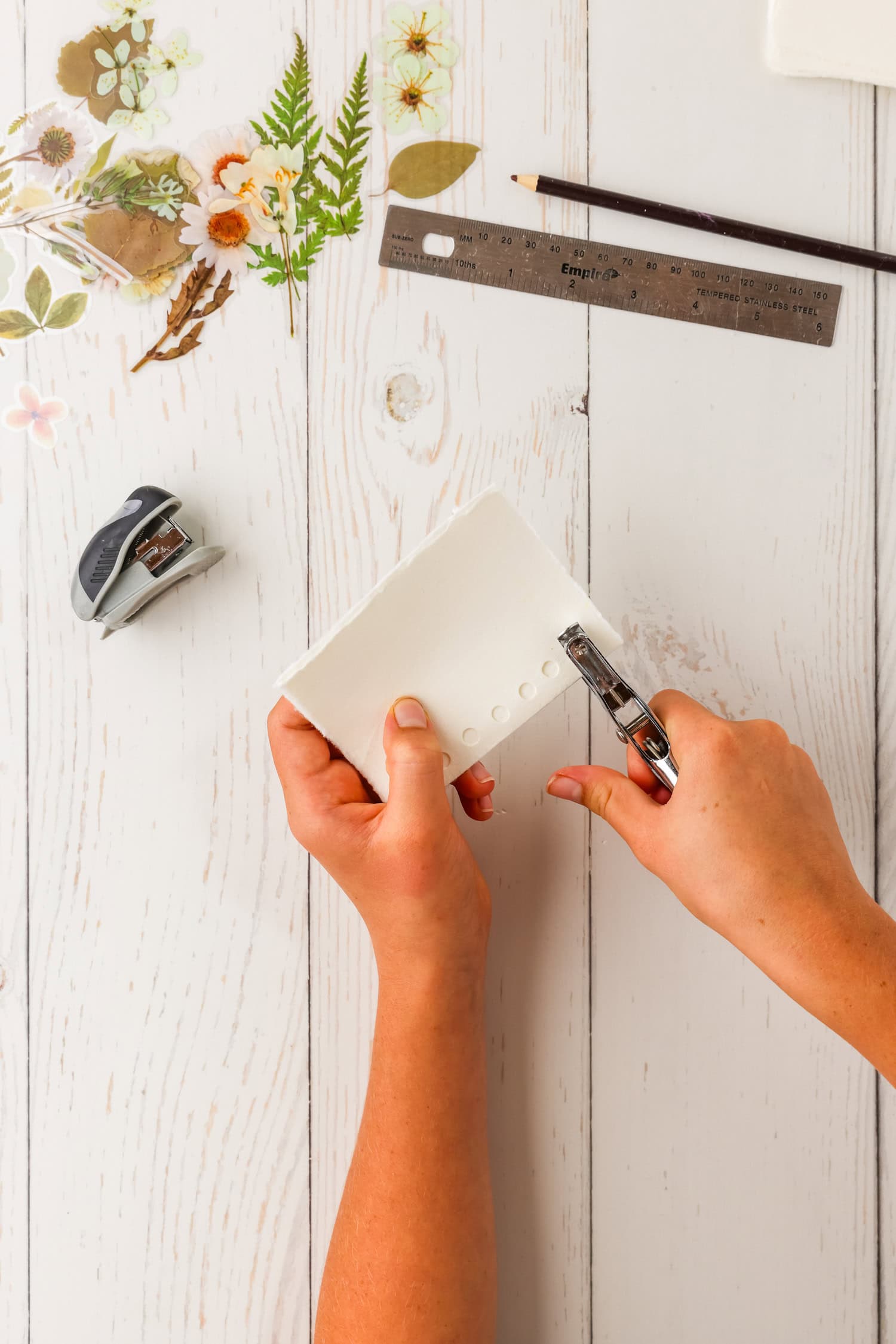 Punching holes for DIY Sticker Book