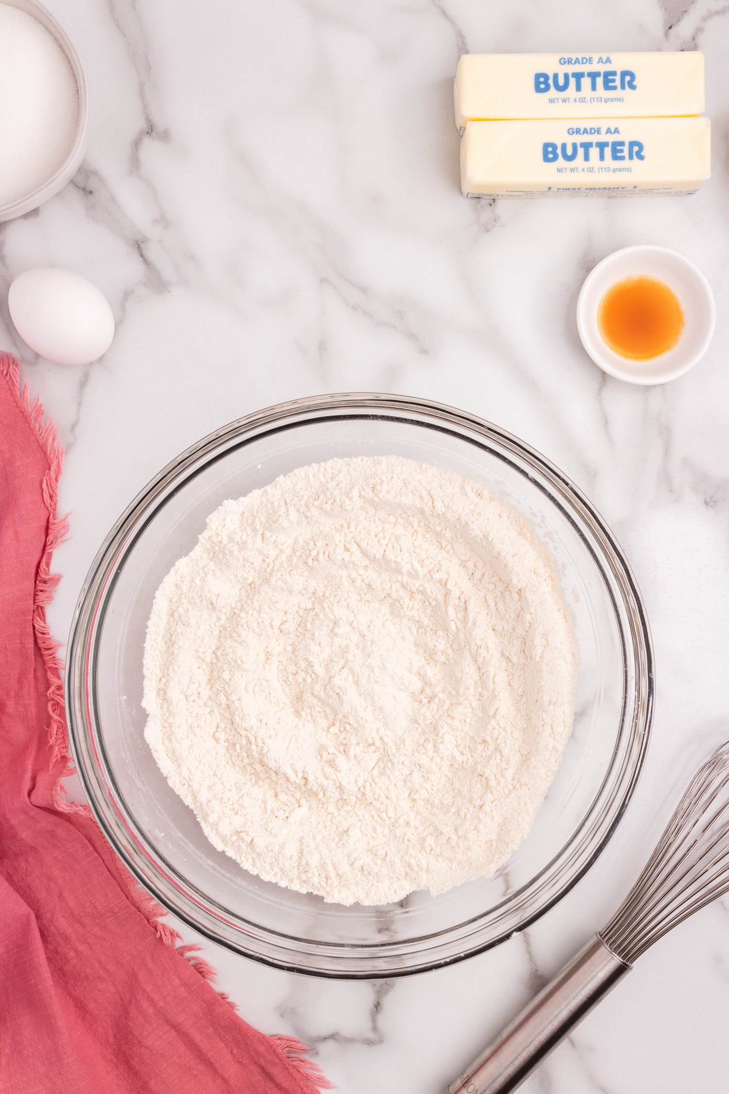 Dry ingredients in glass mixing bowl for Sour Cream Cookies