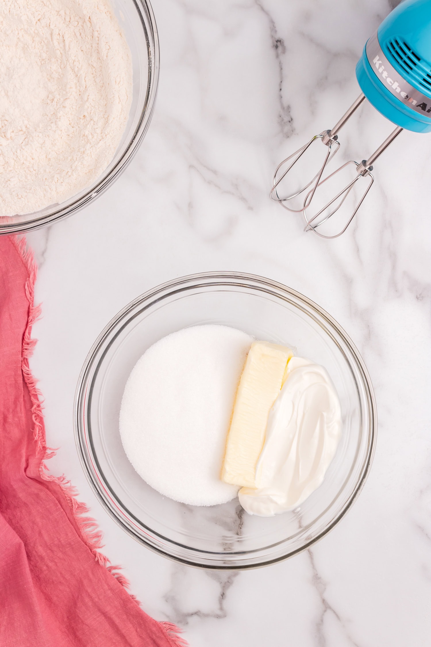 Creaming butter and sour cream into Sour  Cream Cookie recipe