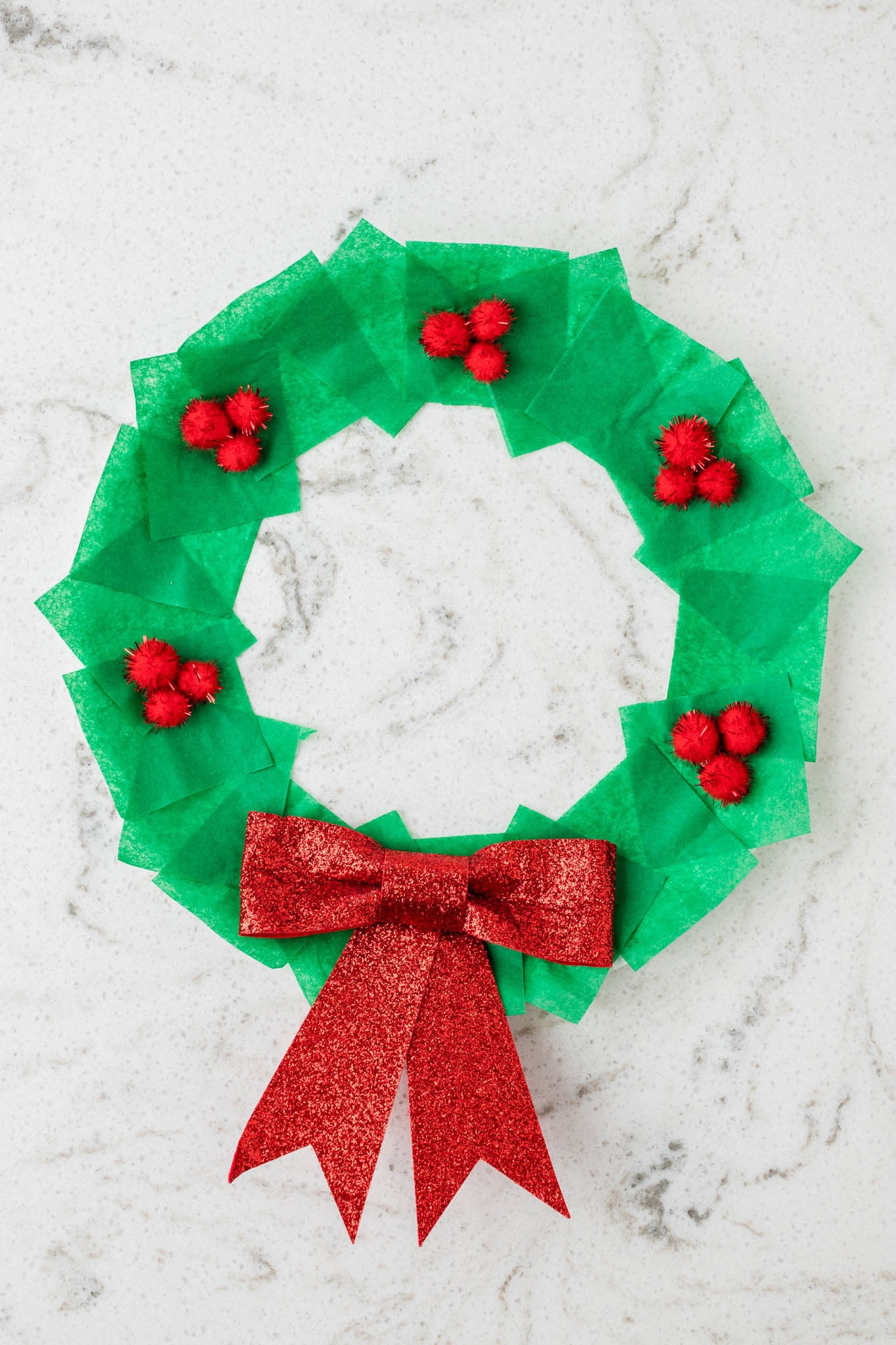 Overhead picture of Tissue Paper Christmas Wreath completed.