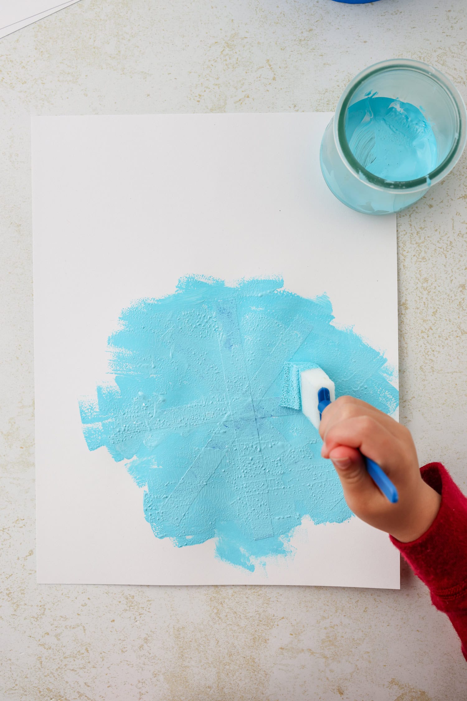 Overhead picture of blue paint on the tape.