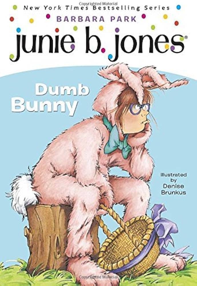 Cover of *Junie B. Jones: Dumb Bunny* by Barbara Park, illustrated by Denise Brunkus. The illustration features Junie B. Jones dressed in a pink bunny costume, sitting on a tree stump with a frustrated expression, holding an Easter basket. The title is displayed in bold white letters against a light blue background.